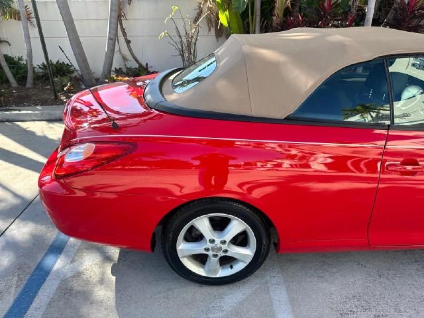 2004 Absolutely Red /Dark Stone Toyota Camry Solara 1 FL SLE LOW MILES 17,713 (4T1FA38P74U) with an 3.3L DOHC SMPI VVT-i 24-Valve V6 Engine engine, Automatic transmission, located at 4701 North Dixie Hwy, Pompano Beach, FL, 33064, (954) 422-2889, 26.240938, -80.123474 - OUR WEBPAGE FLORIDACARS1.COM HAS OVER 100 PHOTOS AND FREE CARFAX LINK 2004 TOYOTA CAMRY SOLARA SLE V6 VIN: 4T1FA38P74U024669 4 T 1 F A 3 8 P 7 4 U 0 2 4 6 6 9 CONVERTIBLE 3.3L V6 F DOHC 24V 29 MPG GASOLINE FRONT WHEEL DRIVE Top Features Alloy Wheels Leather Seats Front Seat Heaters Satellite Radio R - Photo#46