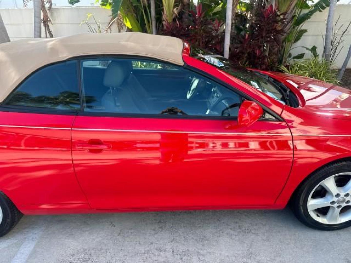 2004 Absolutely Red /Dark Stone Toyota Camry Solara 1 FL SLE LOW MILES 17,713 (4T1FA38P74U) with an 3.3L DOHC SMPI VVT-i 24-Valve V6 Engine engine, Automatic transmission, located at 4701 North Dixie Hwy, Pompano Beach, FL, 33064, (954) 422-2889, 26.240938, -80.123474 - OUR WEBPAGE FLORIDACARS1.COM HAS OVER 100 PHOTOS AND FREE CARFAX LINK 2004 TOYOTA CAMRY SOLARA SLE V6 VIN: 4T1FA38P74U024669 4 T 1 F A 3 8 P 7 4 U 0 2 4 6 6 9 CONVERTIBLE 3.3L V6 F DOHC 24V 29 MPG GASOLINE FRONT WHEEL DRIVE Top Features Alloy Wheels Leather Seats Front Seat Heaters Satellite Radio R - Photo#47
