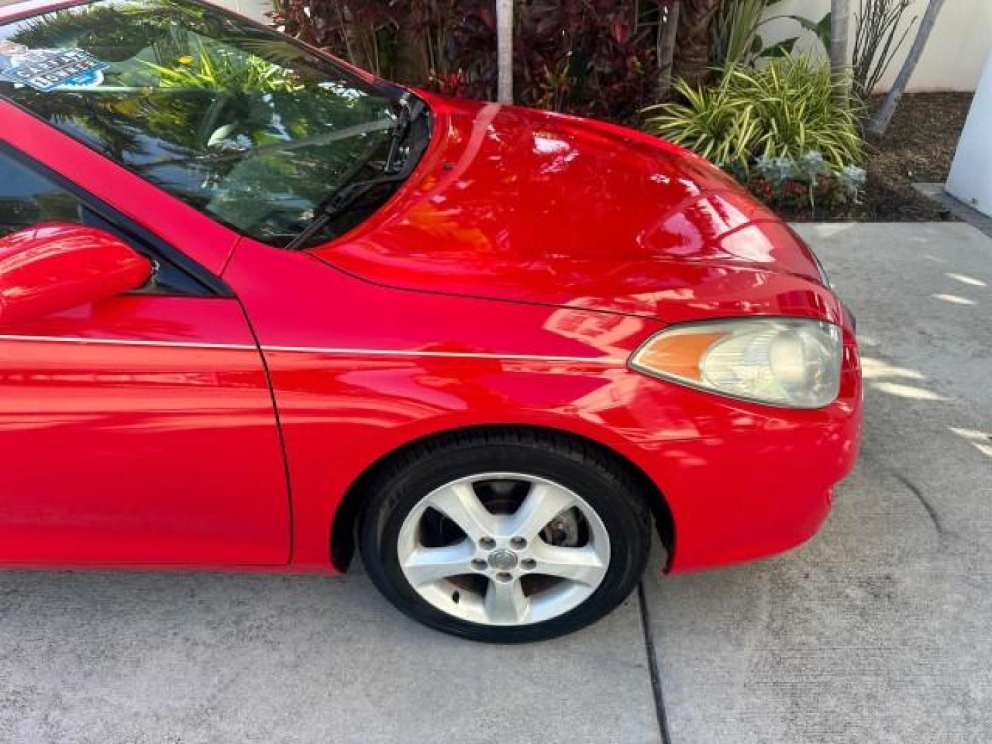2004 Absolutely Red /Dark Stone Toyota Camry Solara 1 FL SLE LOW MILES 17,713 (4T1FA38P74U) with an 3.3L DOHC SMPI VVT-i 24-Valve V6 Engine engine, Automatic transmission, located at 4701 North Dixie Hwy, Pompano Beach, FL, 33064, (954) 422-2889, 26.240938, -80.123474 - OUR WEBPAGE FLORIDACARS1.COM HAS OVER 100 PHOTOS AND FREE CARFAX LINK 2004 TOYOTA CAMRY SOLARA SLE V6 VIN: 4T1FA38P74U024669 4 T 1 F A 3 8 P 7 4 U 0 2 4 6 6 9 CONVERTIBLE 3.3L V6 F DOHC 24V 29 MPG GASOLINE FRONT WHEEL DRIVE Top Features Alloy Wheels Leather Seats Front Seat Heaters Satellite Radio R - Photo#48