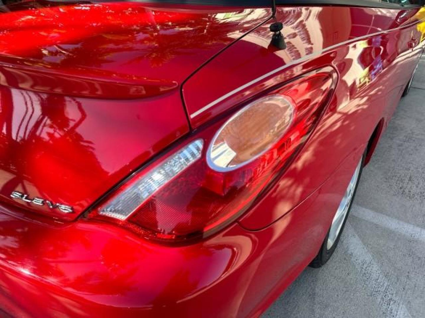 2004 Absolutely Red /Dark Stone Toyota Camry Solara 1 FL SLE LOW MILES 17,713 (4T1FA38P74U) with an 3.3L DOHC SMPI VVT-i 24-Valve V6 Engine engine, Automatic transmission, located at 4701 North Dixie Hwy, Pompano Beach, FL, 33064, (954) 422-2889, 26.240938, -80.123474 - OUR WEBPAGE FLORIDACARS1.COM HAS OVER 100 PHOTOS AND FREE CARFAX LINK 2004 TOYOTA CAMRY SOLARA SLE V6 VIN: 4T1FA38P74U024669 4 T 1 F A 3 8 P 7 4 U 0 2 4 6 6 9 CONVERTIBLE 3.3L V6 F DOHC 24V 29 MPG GASOLINE FRONT WHEEL DRIVE Top Features Alloy Wheels Leather Seats Front Seat Heaters Satellite Radio R - Photo#49