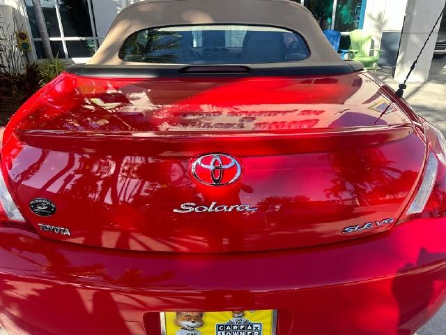 2004 Absolutely Red /Dark Stone Toyota Camry Solara 1 FL SLE LOW MILES 17,713 (4T1FA38P74U) with an 3.3L DOHC SMPI VVT-i 24-Valve V6 Engine engine, Automatic transmission, located at 4701 North Dixie Hwy, Pompano Beach, FL, 33064, (954) 422-2889, 26.240938, -80.123474 - OUR WEBPAGE FLORIDACARS1.COM HAS OVER 100 PHOTOS AND FREE CARFAX LINK 2004 TOYOTA CAMRY SOLARA SLE V6 VIN: 4T1FA38P74U024669 4 T 1 F A 3 8 P 7 4 U 0 2 4 6 6 9 CONVERTIBLE 3.3L V6 F DOHC 24V 29 MPG GASOLINE FRONT WHEEL DRIVE Top Features Alloy Wheels Leather Seats Front Seat Heaters Satellite Radio R - Photo#51