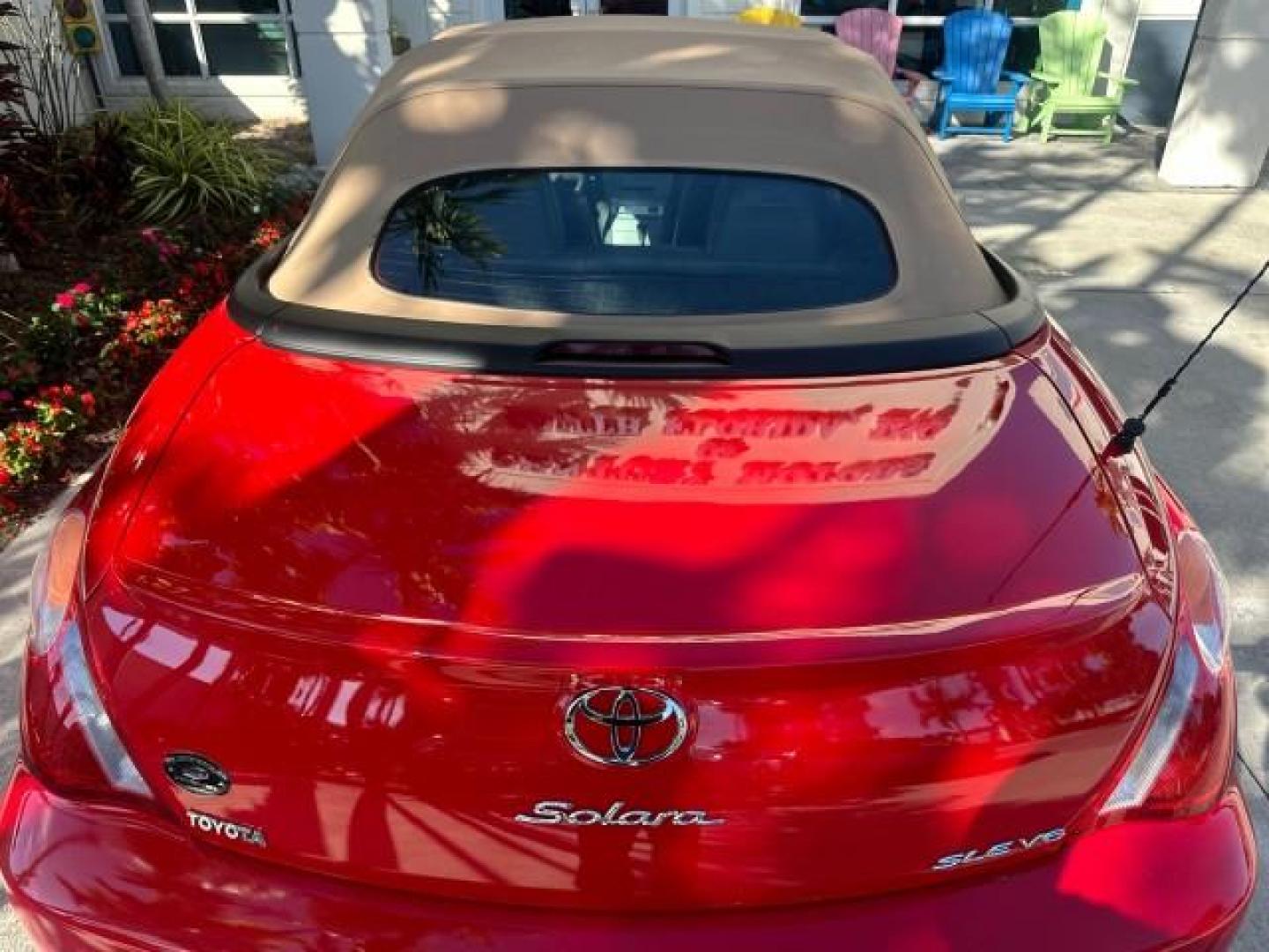 2004 Absolutely Red /Dark Stone Toyota Camry Solara 1 FL SLE LOW MILES 17,713 (4T1FA38P74U) with an 3.3L DOHC SMPI VVT-i 24-Valve V6 Engine engine, Automatic transmission, located at 4701 North Dixie Hwy, Pompano Beach, FL, 33064, (954) 422-2889, 26.240938, -80.123474 - OUR WEBPAGE FLORIDACARS1.COM HAS OVER 100 PHOTOS AND FREE CARFAX LINK 2004 TOYOTA CAMRY SOLARA SLE V6 VIN: 4T1FA38P74U024669 4 T 1 F A 3 8 P 7 4 U 0 2 4 6 6 9 CONVERTIBLE 3.3L V6 F DOHC 24V 29 MPG GASOLINE FRONT WHEEL DRIVE Top Features Alloy Wheels Leather Seats Front Seat Heaters Satellite Radio R - Photo#55