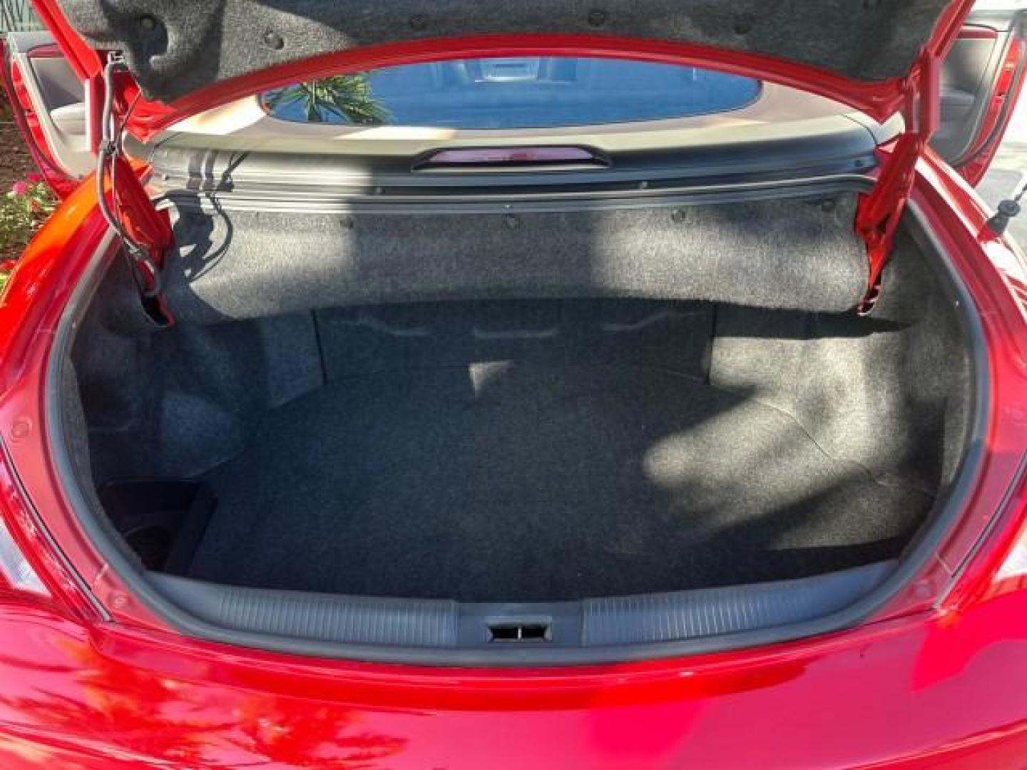 2004 Absolutely Red /Dark Stone Toyota Camry Solara 1 FL SLE LOW MILES 17,713 (4T1FA38P74U) with an 3.3L DOHC SMPI VVT-i 24-Valve V6 Engine engine, Automatic transmission, located at 4701 North Dixie Hwy, Pompano Beach, FL, 33064, (954) 422-2889, 26.240938, -80.123474 - OUR WEBPAGE FLORIDACARS1.COM HAS OVER 100 PHOTOS AND FREE CARFAX LINK 2004 TOYOTA CAMRY SOLARA SLE V6 VIN: 4T1FA38P74U024669 4 T 1 F A 3 8 P 7 4 U 0 2 4 6 6 9 CONVERTIBLE 3.3L V6 F DOHC 24V 29 MPG GASOLINE FRONT WHEEL DRIVE Top Features Alloy Wheels Leather Seats Front Seat Heaters Satellite Radio R - Photo#58