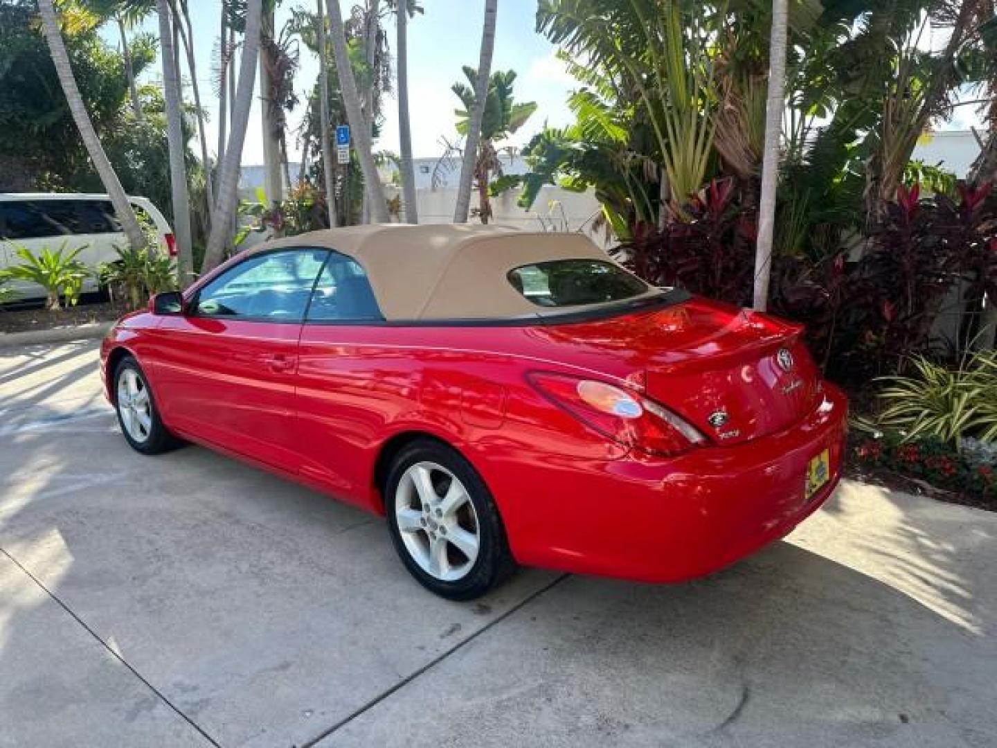2004 Absolutely Red /Dark Stone Toyota Camry Solara 1 FL SLE LOW MILES 17,713 (4T1FA38P74U) with an 3.3L DOHC SMPI VVT-i 24-Valve V6 Engine engine, Automatic transmission, located at 4701 North Dixie Hwy, Pompano Beach, FL, 33064, (954) 422-2889, 26.240938, -80.123474 - OUR WEBPAGE FLORIDACARS1.COM HAS OVER 100 PHOTOS AND FREE CARFAX LINK 2004 TOYOTA CAMRY SOLARA SLE V6 VIN: 4T1FA38P74U024669 4 T 1 F A 3 8 P 7 4 U 0 2 4 6 6 9 CONVERTIBLE 3.3L V6 F DOHC 24V 29 MPG GASOLINE FRONT WHEEL DRIVE Top Features Alloy Wheels Leather Seats Front Seat Heaters Satellite Radio R - Photo#5