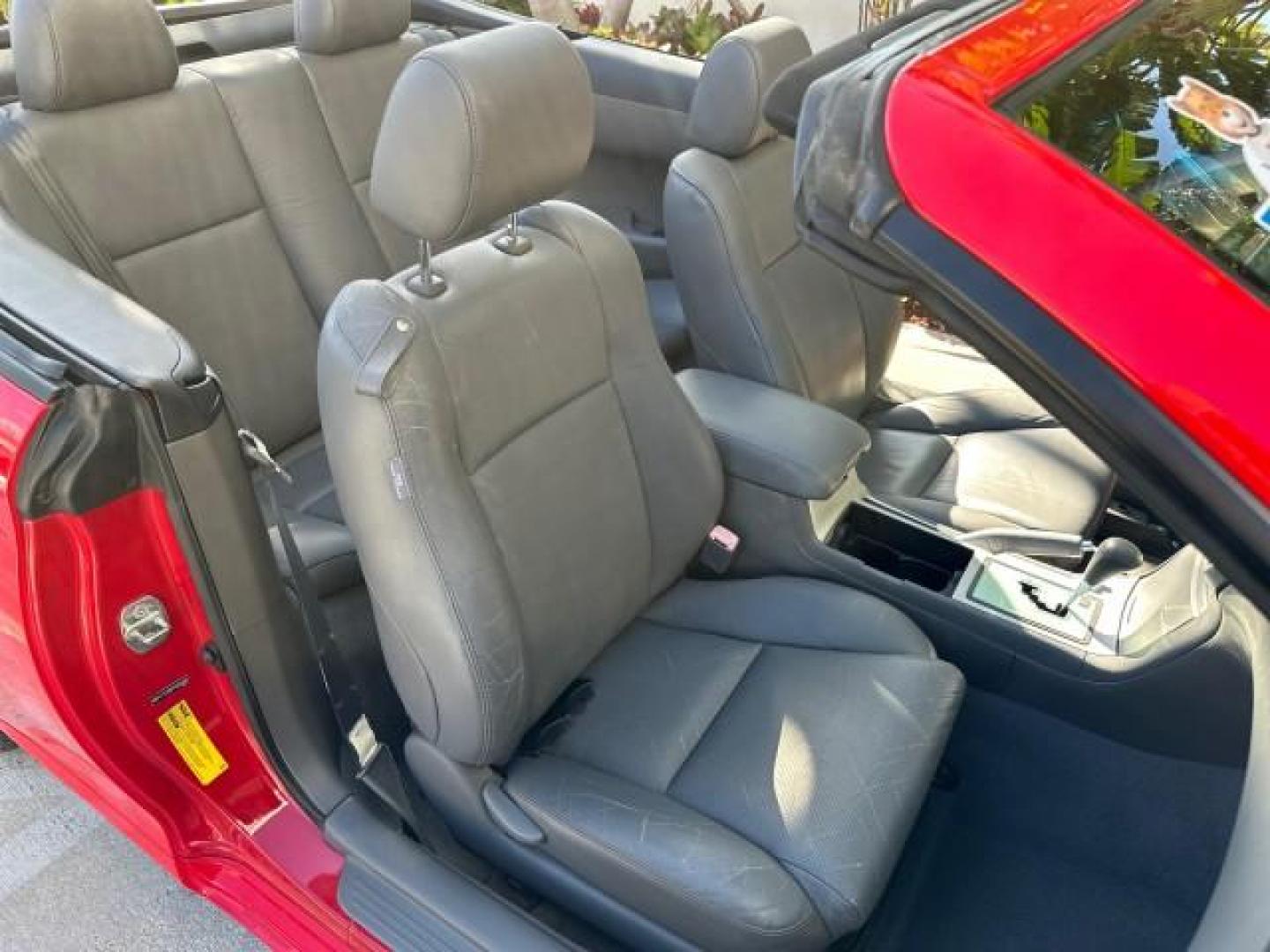 2004 Absolutely Red /Dark Stone Toyota Camry Solara 1 FL SLE LOW MILES 17,713 (4T1FA38P74U) with an 3.3L DOHC SMPI VVT-i 24-Valve V6 Engine engine, Automatic transmission, located at 4701 North Dixie Hwy, Pompano Beach, FL, 33064, (954) 422-2889, 26.240938, -80.123474 - OUR WEBPAGE FLORIDACARS1.COM HAS OVER 100 PHOTOS AND FREE CARFAX LINK 2004 TOYOTA CAMRY SOLARA SLE V6 VIN: 4T1FA38P74U024669 4 T 1 F A 3 8 P 7 4 U 0 2 4 6 6 9 CONVERTIBLE 3.3L V6 F DOHC 24V 29 MPG GASOLINE FRONT WHEEL DRIVE Top Features Alloy Wheels Leather Seats Front Seat Heaters Satellite Radio R - Photo#67