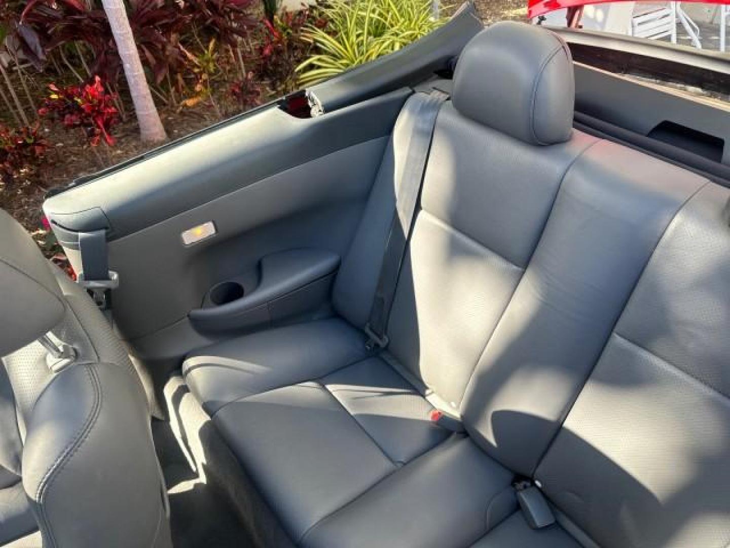 2004 Absolutely Red /Dark Stone Toyota Camry Solara 1 FL SLE LOW MILES 17,713 (4T1FA38P74U) with an 3.3L DOHC SMPI VVT-i 24-Valve V6 Engine engine, Automatic transmission, located at 4701 North Dixie Hwy, Pompano Beach, FL, 33064, (954) 422-2889, 26.240938, -80.123474 - OUR WEBPAGE FLORIDACARS1.COM HAS OVER 100 PHOTOS AND FREE CARFAX LINK 2004 TOYOTA CAMRY SOLARA SLE V6 VIN: 4T1FA38P74U024669 4 T 1 F A 3 8 P 7 4 U 0 2 4 6 6 9 CONVERTIBLE 3.3L V6 F DOHC 24V 29 MPG GASOLINE FRONT WHEEL DRIVE Top Features Alloy Wheels Leather Seats Front Seat Heaters Satellite Radio R - Photo#72