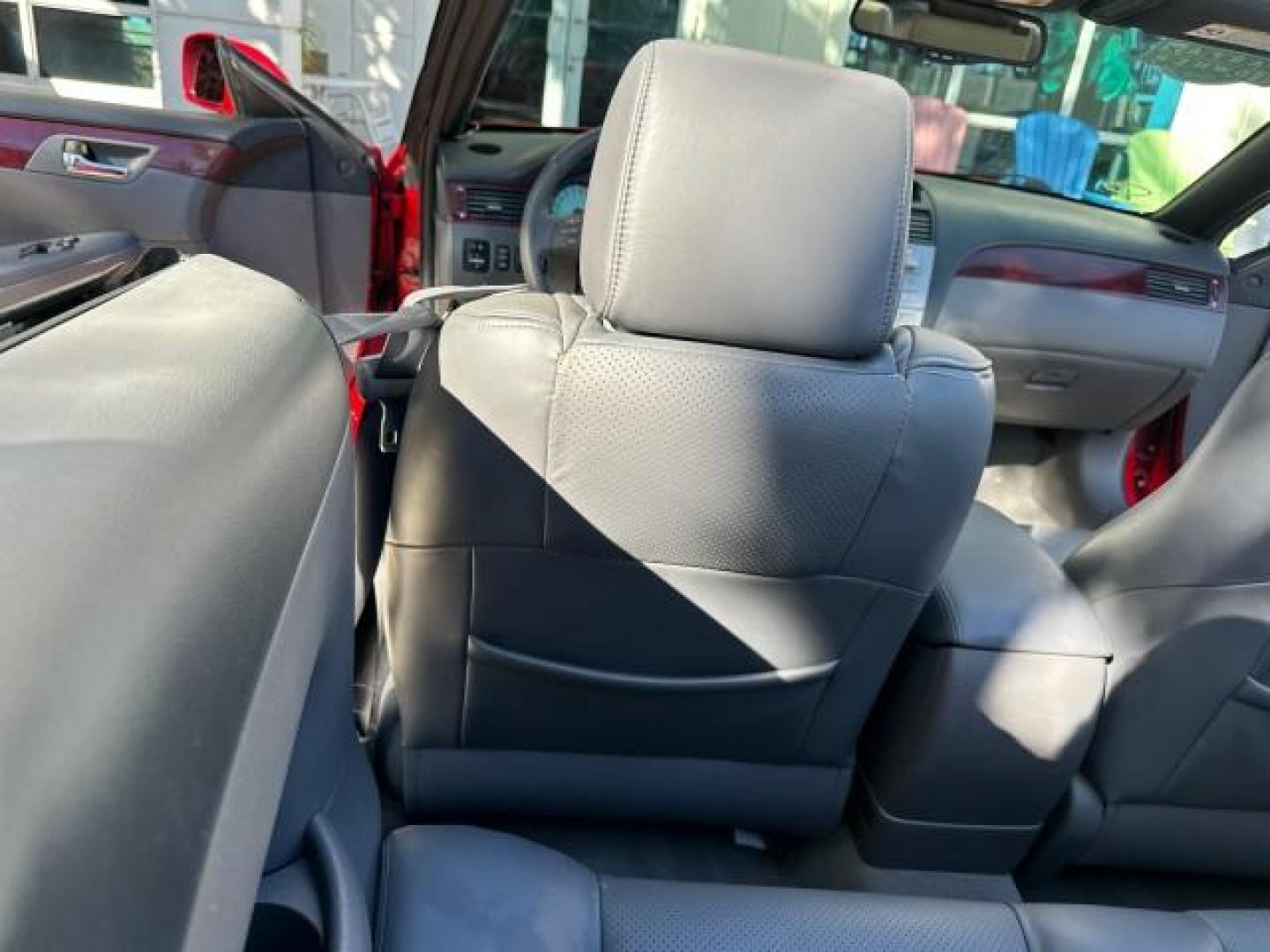2004 Absolutely Red /Dark Stone Toyota Camry Solara 1 FL SLE LOW MILES 17,713 (4T1FA38P74U) with an 3.3L DOHC SMPI VVT-i 24-Valve V6 Engine engine, Automatic transmission, located at 4701 North Dixie Hwy, Pompano Beach, FL, 33064, (954) 422-2889, 26.240938, -80.123474 - OUR WEBPAGE FLORIDACARS1.COM HAS OVER 100 PHOTOS AND FREE CARFAX LINK 2004 TOYOTA CAMRY SOLARA SLE V6 VIN: 4T1FA38P74U024669 4 T 1 F A 3 8 P 7 4 U 0 2 4 6 6 9 CONVERTIBLE 3.3L V6 F DOHC 24V 29 MPG GASOLINE FRONT WHEEL DRIVE Top Features Alloy Wheels Leather Seats Front Seat Heaters Satellite Radio R - Photo#73