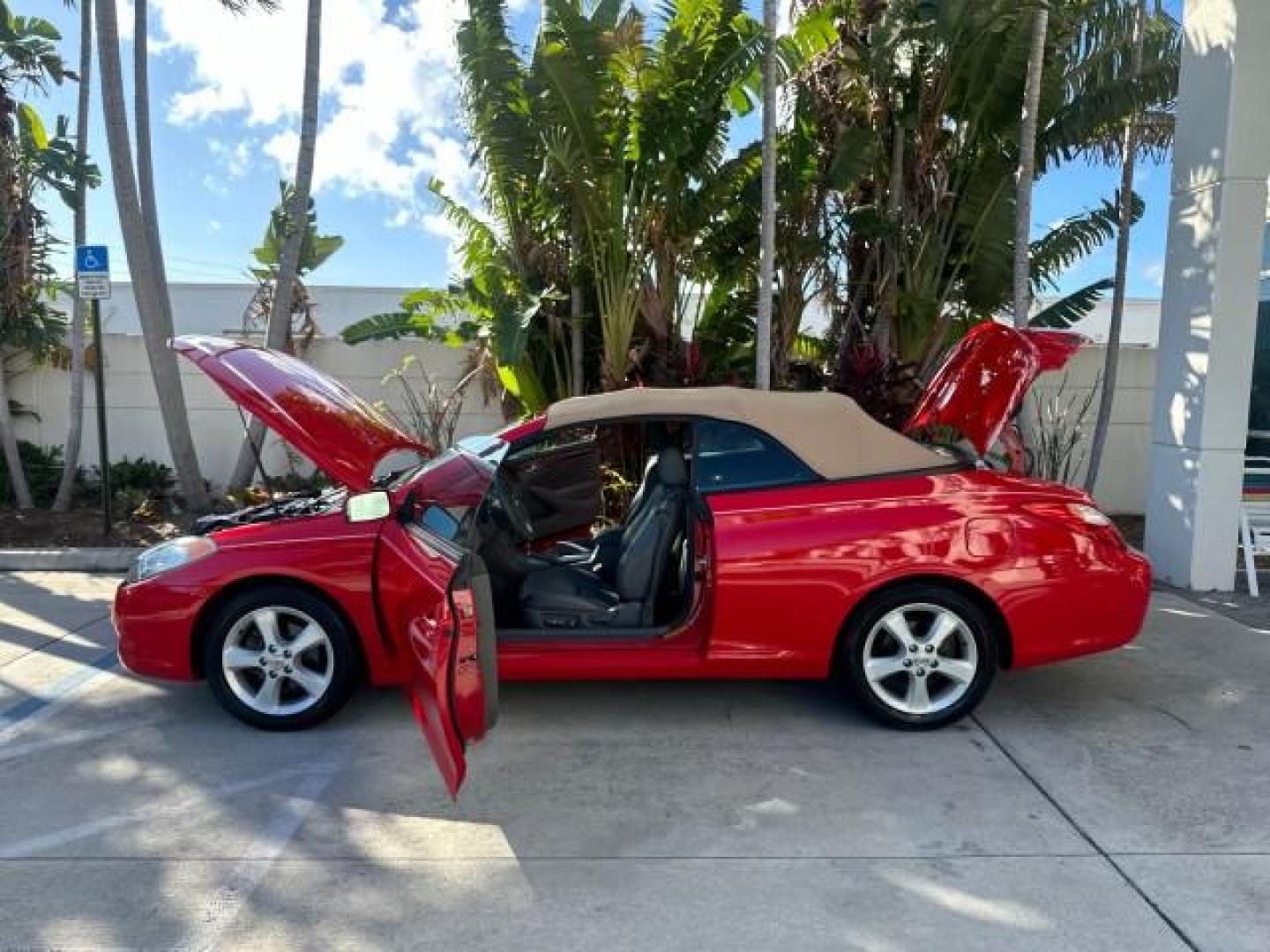 2004 Absolutely Red /Dark Stone Toyota Camry Solara 1 FL SLE LOW MILES 17,713 (4T1FA38P74U) with an 3.3L DOHC SMPI VVT-i 24-Valve V6 Engine engine, Automatic transmission, located at 4701 North Dixie Hwy, Pompano Beach, FL, 33064, (954) 422-2889, 26.240938, -80.123474 - OUR WEBPAGE FLORIDACARS1.COM HAS OVER 100 PHOTOS AND FREE CARFAX LINK 2004 TOYOTA CAMRY SOLARA SLE V6 VIN: 4T1FA38P74U024669 4 T 1 F A 3 8 P 7 4 U 0 2 4 6 6 9 CONVERTIBLE 3.3L V6 F DOHC 24V 29 MPG GASOLINE FRONT WHEEL DRIVE Top Features Alloy Wheels Leather Seats Front Seat Heaters Satellite Radio R - Photo#8