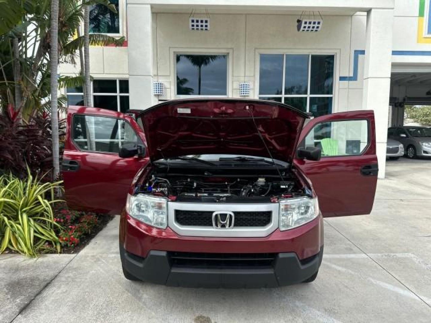 2010 Tango Red Pearl /Gray Honda Element EX LOW MILES FL TITLE (5J6YH1H71AL) with an 2.4L DOHC MPFI 16-Valve i-VTEC I4 Engine engine, Automatic transmission, located at 4701 North Dixie Hwy, Pompano Beach, FL, 33064, (954) 422-2889, 26.240938, -80.123474 - OUR WEBPAGE FLORIDACARS1.COM HAS OVER 100 PHOTOS AND FREE CARFAX LINK 2010 HONDA ELEMENT EX VIN: 5J6YH1H71AL003602 4 DOOR WAGON/SPORT UTILITY 2.4L I4 F DOHC 16V GASOLINE FRONT WHEEL DRIVE Basic Features ABS Brakes Auxiliary Audio Input Power Locks Side Airbags AM/FM Stereo CD Audio Power Mirrors Tra - Photo#9