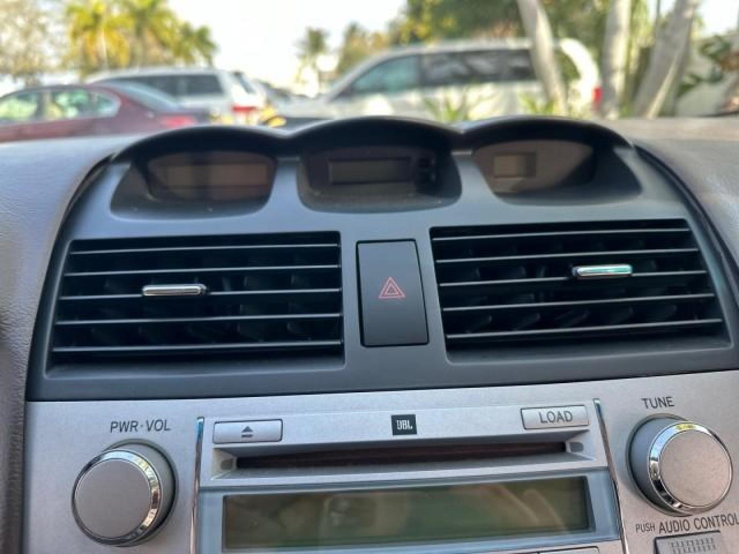 2006 Arctic Frost Pearl /Ivory Toyota Camry Solara LOW MILES 46,220 SLE V6 (4T1FA38P76U) with an 3.3L DOHC SMPI 24-Valve V6 Engine engine, Automatic transmission, located at 4701 North Dixie Hwy, Pompano Beach, FL, 33064, (954) 422-2889, 26.240938, -80.123474 - OUR WEBPAGE FLORIDACARS1.COM HAS OVER 100 PHOTOS AND FREE CARFAX LINK 2006 TOYOTA CAMRY SOLARA SLE V6 TOP OF THE LINE VIN: 4T1FA38P76U086754 4 T 1 F A 3 8 P 7 6 U 0 8 6 7 5 4 CONVERTIBLE 3.3L V6 F DOHC 24V GASOLINE 29 MPG FRONT WHEEL DRIVE Top Features Alloy Wheels Leather Seats Front Seat Heaters S - Photo#24