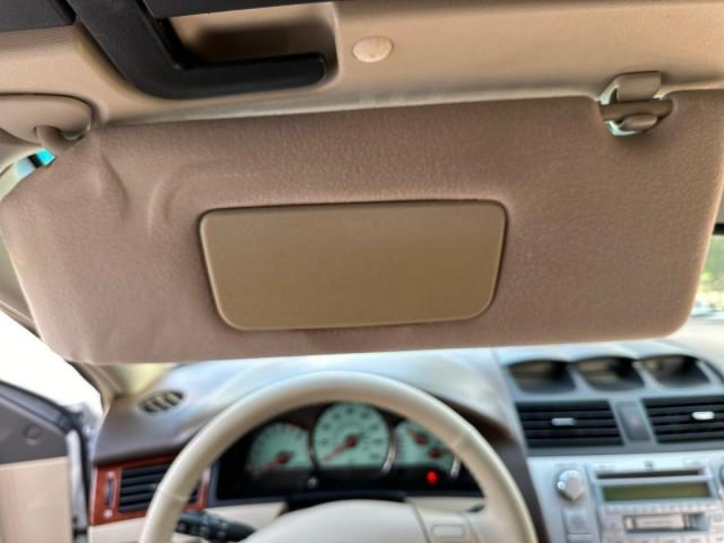 2006 Arctic Frost Pearl /Ivory Toyota Camry Solara LOW MILES 46,220 SLE V6 (4T1FA38P76U) with an 3.3L DOHC SMPI 24-Valve V6 Engine engine, Automatic transmission, located at 4701 North Dixie Hwy, Pompano Beach, FL, 33064, (954) 422-2889, 26.240938, -80.123474 - OUR WEBPAGE FLORIDACARS1.COM HAS OVER 100 PHOTOS AND FREE CARFAX LINK 2006 TOYOTA CAMRY SOLARA SLE V6 TOP OF THE LINE VIN: 4T1FA38P76U086754 4 T 1 F A 3 8 P 7 6 U 0 8 6 7 5 4 CONVERTIBLE 3.3L V6 F DOHC 24V GASOLINE 29 MPG FRONT WHEEL DRIVE Top Features Alloy Wheels Leather Seats Front Seat Heaters S - Photo#27