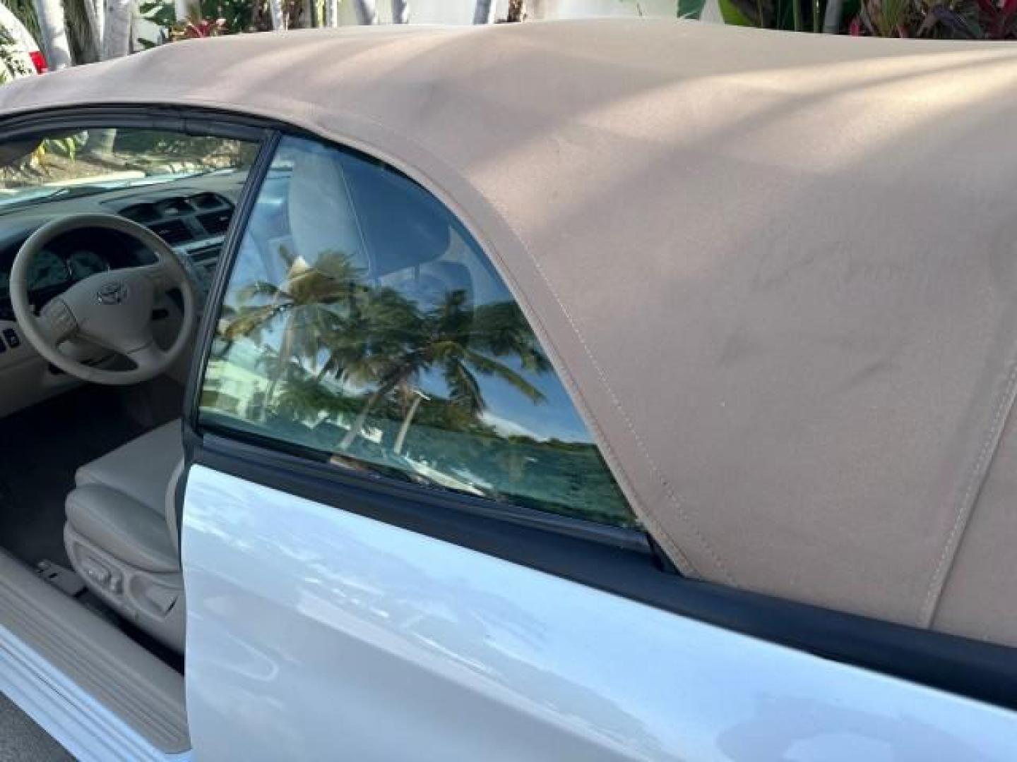 2006 Arctic Frost Pearl /Ivory Toyota Camry Solara LOW MILES 46,220 SLE V6 (4T1FA38P76U) with an 3.3L DOHC SMPI 24-Valve V6 Engine engine, Automatic transmission, located at 4701 North Dixie Hwy, Pompano Beach, FL, 33064, (954) 422-2889, 26.240938, -80.123474 - OUR WEBPAGE FLORIDACARS1.COM HAS OVER 100 PHOTOS AND FREE CARFAX LINK 2006 TOYOTA CAMRY SOLARA SLE V6 TOP OF THE LINE VIN: 4T1FA38P76U086754 4 T 1 F A 3 8 P 7 6 U 0 8 6 7 5 4 CONVERTIBLE 3.3L V6 F DOHC 24V GASOLINE 29 MPG FRONT WHEEL DRIVE Top Features Alloy Wheels Leather Seats Front Seat Heaters S - Photo#32