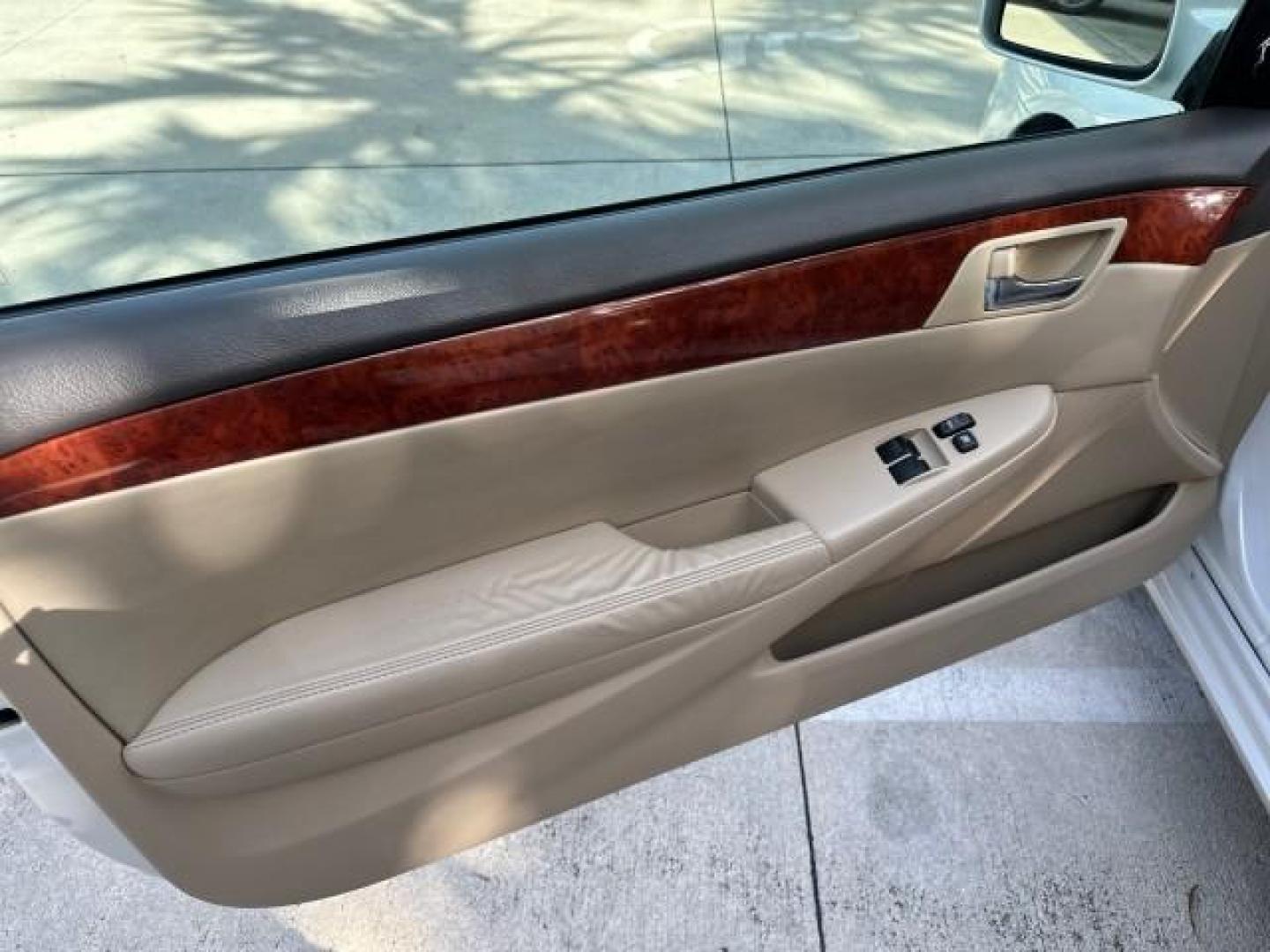 2006 Arctic Frost Pearl /Ivory Toyota Camry Solara LOW MILES 46,220 SLE V6 (4T1FA38P76U) with an 3.3L DOHC SMPI 24-Valve V6 Engine engine, Automatic transmission, located at 4701 North Dixie Hwy, Pompano Beach, FL, 33064, (954) 422-2889, 26.240938, -80.123474 - OUR WEBPAGE FLORIDACARS1.COM HAS OVER 100 PHOTOS AND FREE CARFAX LINK 2006 TOYOTA CAMRY SOLARA SLE V6 TOP OF THE LINE VIN: 4T1FA38P76U086754 4 T 1 F A 3 8 P 7 6 U 0 8 6 7 5 4 CONVERTIBLE 3.3L V6 F DOHC 24V GASOLINE 29 MPG FRONT WHEEL DRIVE Top Features Alloy Wheels Leather Seats Front Seat Heaters S - Photo#46