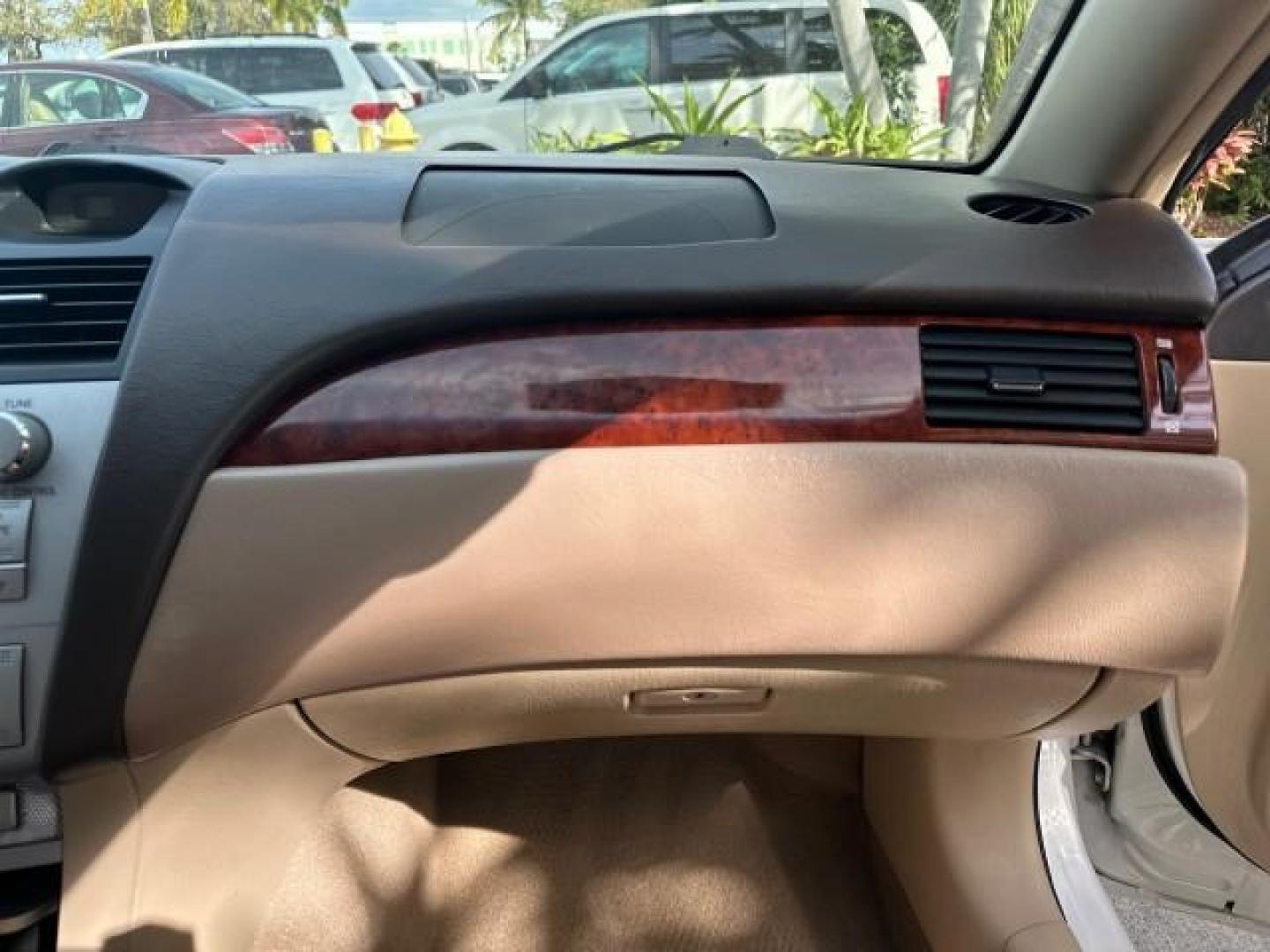 2006 Arctic Frost Pearl /Ivory Toyota Camry Solara LOW MILES 46,220 SLE V6 (4T1FA38P76U) with an 3.3L DOHC SMPI 24-Valve V6 Engine engine, Automatic transmission, located at 4701 North Dixie Hwy, Pompano Beach, FL, 33064, (954) 422-2889, 26.240938, -80.123474 - OUR WEBPAGE FLORIDACARS1.COM HAS OVER 100 PHOTOS AND FREE CARFAX LINK 2006 TOYOTA CAMRY SOLARA SLE V6 TOP OF THE LINE VIN: 4T1FA38P76U086754 4 T 1 F A 3 8 P 7 6 U 0 8 6 7 5 4 CONVERTIBLE 3.3L V6 F DOHC 24V GASOLINE 29 MPG FRONT WHEEL DRIVE Top Features Alloy Wheels Leather Seats Front Seat Heaters S - Photo#56