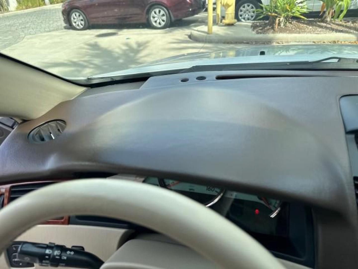 2006 Arctic Frost Pearl /Ivory Toyota Camry Solara LOW MILES 46,220 SLE V6 (4T1FA38P76U) with an 3.3L DOHC SMPI 24-Valve V6 Engine engine, Automatic transmission, located at 4701 North Dixie Hwy, Pompano Beach, FL, 33064, (954) 422-2889, 26.240938, -80.123474 - OUR WEBPAGE FLORIDACARS1.COM HAS OVER 100 PHOTOS AND FREE CARFAX LINK 2006 TOYOTA CAMRY SOLARA SLE V6 TOP OF THE LINE VIN: 4T1FA38P76U086754 4 T 1 F A 3 8 P 7 6 U 0 8 6 7 5 4 CONVERTIBLE 3.3L V6 F DOHC 24V GASOLINE 29 MPG FRONT WHEEL DRIVE Top Features Alloy Wheels Leather Seats Front Seat Heaters S - Photo#58