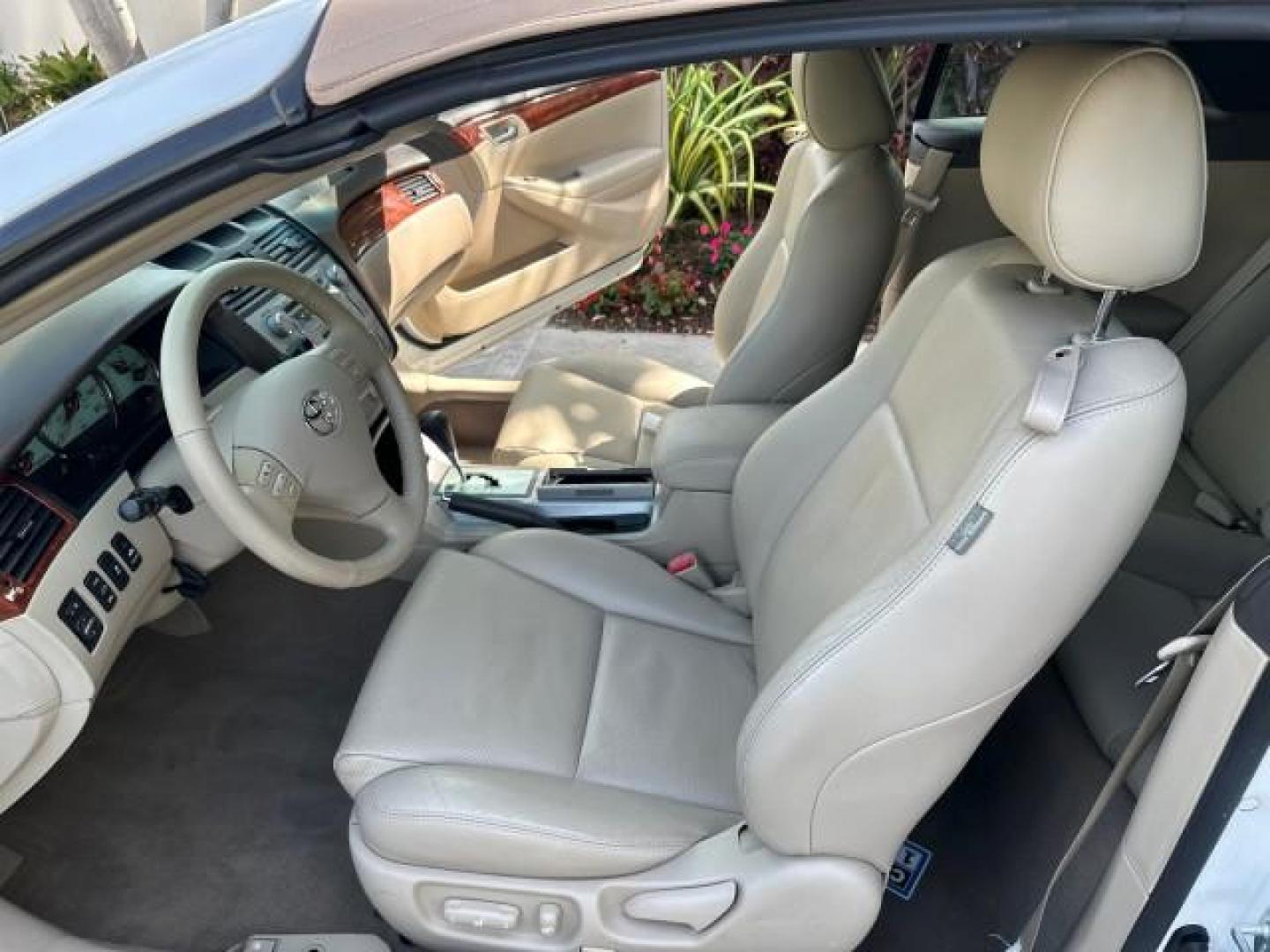 2006 Arctic Frost Pearl /Ivory Toyota Camry Solara LOW MILES 46,220 SLE V6 (4T1FA38P76U) with an 3.3L DOHC SMPI 24-Valve V6 Engine engine, Automatic transmission, located at 4701 North Dixie Hwy, Pompano Beach, FL, 33064, (954) 422-2889, 26.240938, -80.123474 - OUR WEBPAGE FLORIDACARS1.COM HAS OVER 100 PHOTOS AND FREE CARFAX LINK 2006 TOYOTA CAMRY SOLARA SLE V6 TOP OF THE LINE VIN: 4T1FA38P76U086754 4 T 1 F A 3 8 P 7 6 U 0 8 6 7 5 4 CONVERTIBLE 3.3L V6 F DOHC 24V GASOLINE 29 MPG FRONT WHEEL DRIVE Top Features Alloy Wheels Leather Seats Front Seat Heaters S - Photo#62