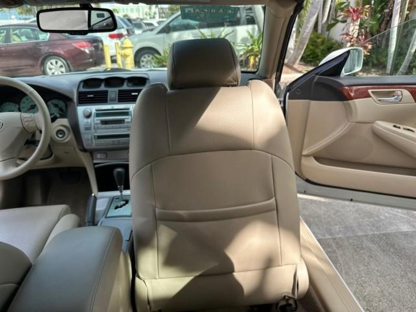 2006 Arctic Frost Pearl /Ivory Toyota Camry Solara LOW MILES 46,220 SLE V6 (4T1FA38P76U) with an 3.3L DOHC SMPI 24-Valve V6 Engine engine, Automatic transmission, located at 4701 North Dixie Hwy, Pompano Beach, FL, 33064, (954) 422-2889, 26.240938, -80.123474 - OUR WEBPAGE FLORIDACARS1.COM HAS OVER 100 PHOTOS AND FREE CARFAX LINK 2006 TOYOTA CAMRY SOLARA SLE V6 TOP OF THE LINE VIN: 4T1FA38P76U086754 4 T 1 F A 3 8 P 7 6 U 0 8 6 7 5 4 CONVERTIBLE 3.3L V6 F DOHC 24V GASOLINE 29 MPG FRONT WHEEL DRIVE Top Features Alloy Wheels Leather Seats Front Seat Heaters S - Photo#69