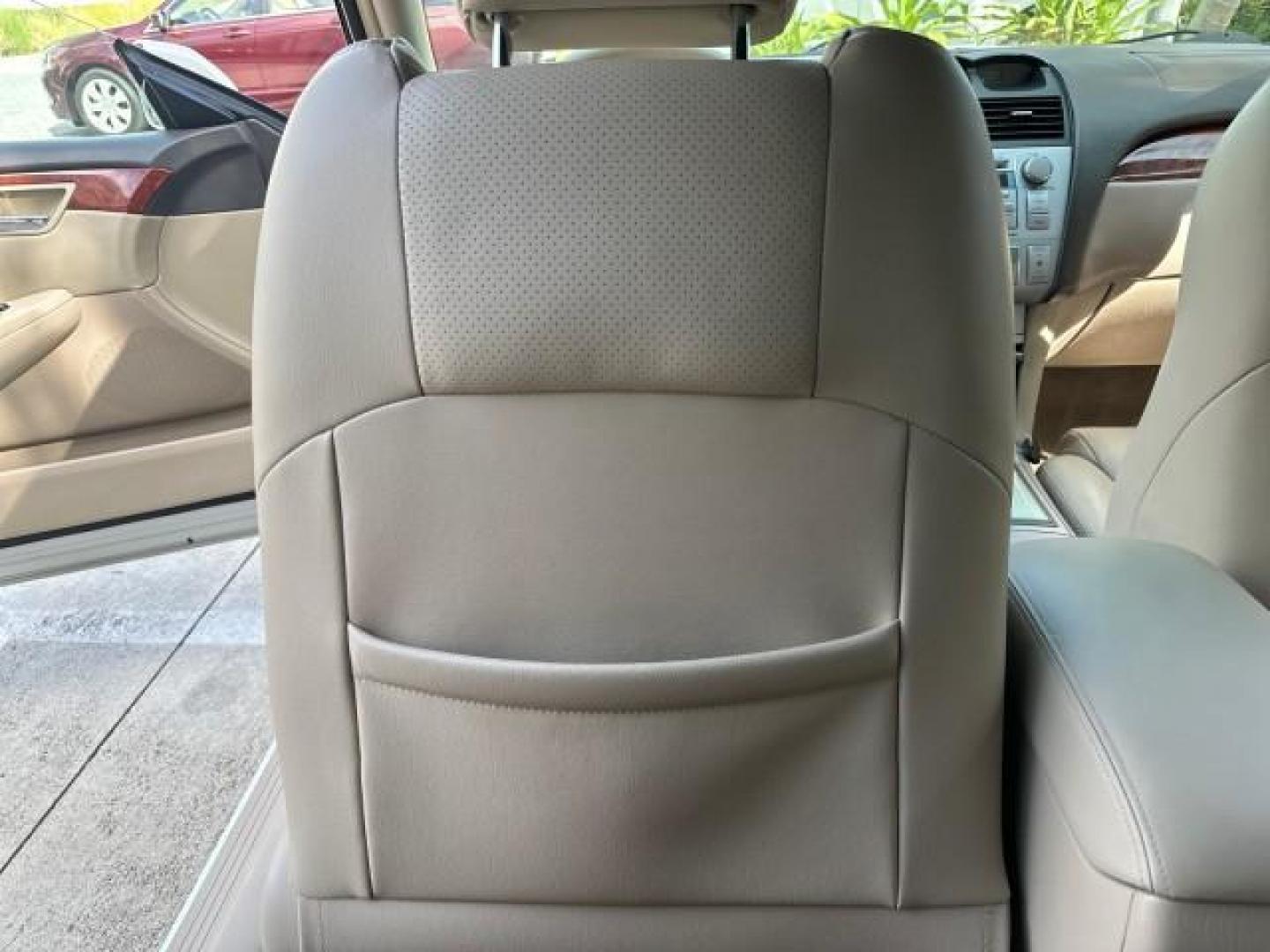 2006 Arctic Frost Pearl /Ivory Toyota Camry Solara LOW MILES 46,220 SLE V6 (4T1FA38P76U) with an 3.3L DOHC SMPI 24-Valve V6 Engine engine, Automatic transmission, located at 4701 North Dixie Hwy, Pompano Beach, FL, 33064, (954) 422-2889, 26.240938, -80.123474 - OUR WEBPAGE FLORIDACARS1.COM HAS OVER 100 PHOTOS AND FREE CARFAX LINK 2006 TOYOTA CAMRY SOLARA SLE V6 TOP OF THE LINE VIN: 4T1FA38P76U086754 4 T 1 F A 3 8 P 7 6 U 0 8 6 7 5 4 CONVERTIBLE 3.3L V6 F DOHC 24V GASOLINE 29 MPG FRONT WHEEL DRIVE Top Features Alloy Wheels Leather Seats Front Seat Heaters S - Photo#75