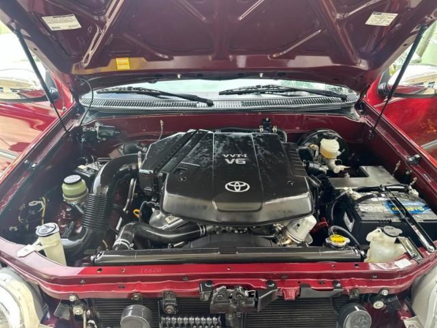 2006 Salsa Red Pearl /Light Charcoal Toyota Tundra SR5 1 OWNER LOW MILES 64,232 (5TBRU34146S) with an 4.0L DOHC SEFI 24-Valve V6 Engine engine, Automatic transmission, located at 4701 North Dixie Hwy, Pompano Beach, FL, 33064, (954) 422-2889, 26.240938, -80.123474 - OUR WEBPAGE FLORIDACARS1.COM HAS OVER 100 PHOTOS AND FREE CARFAX LINK 2006 TOYOTA TUNDRA SR5 VIN: 5TBRU34146S465329 5 T B R U 3 4 1 4 6 S 4 6 5 3 2 9 4 DOOR EXTENDED CAB PICKUP 4.0L V6 F DOHC 24V GASOLINE REAR WHEEL DRIVE Top Features Bed Liner Cloth Seats Running Boards Basic Features ABS Brakes Au - Photo#18