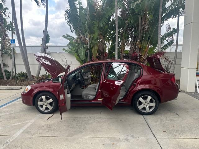 2008 Sport Red Tintcoat /Gray Chevrolet Cobalt LT LOW MILES 60,652 (1G1AL58F287) with an Ecotec 2.2L DOHC 16-Valve 4-Cyl SFI Engine engine, Automatic transmission, located at 4701 North Dixie Hwy, Pompano Beach, FL, 33064, (954) 422-2889, 26.240938, -80.123474 - OUR WEBPAGE FLORIDACARS1.COM HAS OVER 100 PHOTOS AND FREE CARFAX LINK 2008 CHEVROLET COBALT LT VIN: 1G1AL58F287179140 1 G 1 A L 5 8 F 2 8 7 1 7 9 1 4 0 SEDAN 4 DR 2.2L I4 F DOHC 16V GASOLINE 33 MPG GREAT COMMUTER CAR FRONT WHEEL DRIVE Top Features Alloy Wheels Cloth Seats Satellite Radio Ready Basic - Photo#9