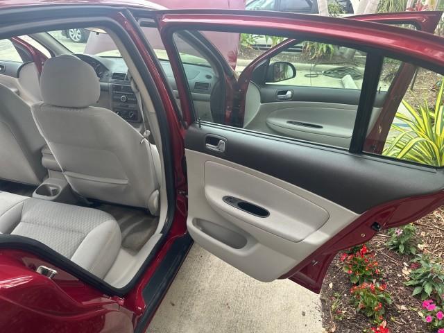 2008 Sport Red Tintcoat /Gray Chevrolet Cobalt LT LOW MILES 60,652 (1G1AL58F287) with an Ecotec 2.2L DOHC 16-Valve 4-Cyl SFI Engine engine, Automatic transmission, located at 4701 North Dixie Hwy, Pompano Beach, FL, 33064, (954) 422-2889, 26.240938, -80.123474 - OUR WEBPAGE FLORIDACARS1.COM HAS OVER 100 PHOTOS AND FREE CARFAX LINK 2008 CHEVROLET COBALT LT VIN: 1G1AL58F287179140 1 G 1 A L 5 8 F 2 8 7 1 7 9 1 4 0 SEDAN 4 DR 2.2L I4 F DOHC 16V GASOLINE 33 MPG GREAT COMMUTER CAR FRONT WHEEL DRIVE Top Features Alloy Wheels Cloth Seats Satellite Radio Ready Basic - Photo#14