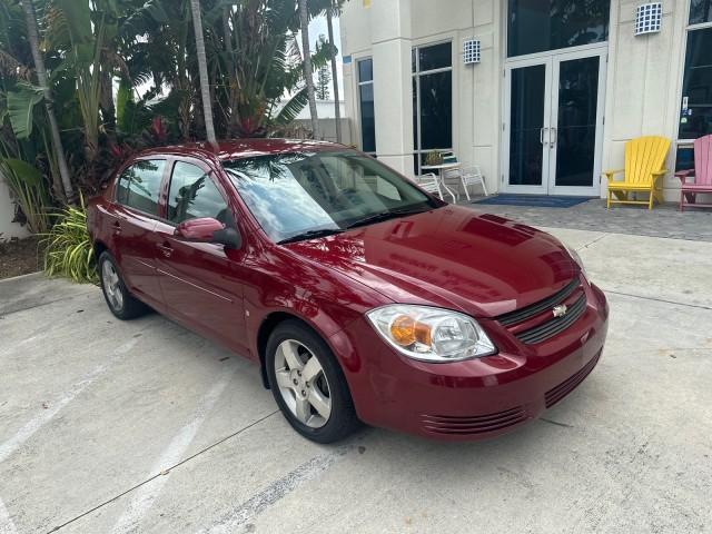 2008 Sport Red Tintcoat /Gray Chevrolet Cobalt LT LOW MILES 60,652 (1G1AL58F287) with an Ecotec 2.2L DOHC 16-Valve 4-Cyl SFI Engine engine, Automatic transmission, located at 4701 North Dixie Hwy, Pompano Beach, FL, 33064, (954) 422-2889, 26.240938, -80.123474 - OUR WEBPAGE FLORIDACARS1.COM HAS OVER 100 PHOTOS AND FREE CARFAX LINK 2008 CHEVROLET COBALT LT VIN: 1G1AL58F287179140 1 G 1 A L 5 8 F 2 8 7 1 7 9 1 4 0 SEDAN 4 DR 2.2L I4 F DOHC 16V GASOLINE 33 MPG GREAT COMMUTER CAR FRONT WHEEL DRIVE Top Features Alloy Wheels Cloth Seats Satellite Radio Ready Basic - Photo#1