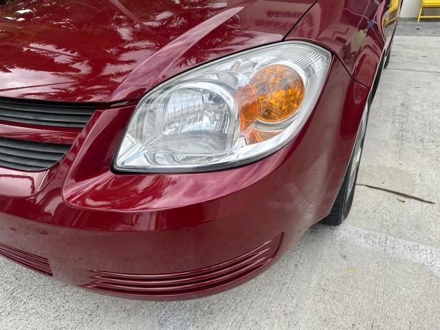 2008 Sport Red Tintcoat /Gray Chevrolet Cobalt LT LOW MILES 60,652 (1G1AL58F287) with an Ecotec 2.2L DOHC 16-Valve 4-Cyl SFI Engine engine, Automatic transmission, located at 4701 North Dixie Hwy, Pompano Beach, FL, 33064, (954) 422-2889, 26.240938, -80.123474 - OUR WEBPAGE FLORIDACARS1.COM HAS OVER 100 PHOTOS AND FREE CARFAX LINK 2008 CHEVROLET COBALT LT VIN: 1G1AL58F287179140 1 G 1 A L 5 8 F 2 8 7 1 7 9 1 4 0 SEDAN 4 DR 2.2L I4 F DOHC 16V GASOLINE 33 MPG GREAT COMMUTER CAR FRONT WHEEL DRIVE Top Features Alloy Wheels Cloth Seats Satellite Radio Ready Basic - Photo#25