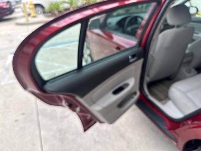 2008 Sport Red Tintcoat /Gray Chevrolet Cobalt LT LOW MILES 60,652 (1G1AL58F287) with an Ecotec 2.2L DOHC 16-Valve 4-Cyl SFI Engine engine, Automatic transmission, located at 4701 North Dixie Hwy, Pompano Beach, FL, 33064, (954) 422-2889, 26.240938, -80.123474 - OUR WEBPAGE FLORIDACARS1.COM HAS OVER 100 PHOTOS AND FREE CARFAX LINK 2008 CHEVROLET COBALT LT VIN: 1G1AL58F287179140 1 G 1 A L 5 8 F 2 8 7 1 7 9 1 4 0 SEDAN 4 DR 2.2L I4 F DOHC 16V GASOLINE 33 MPG GREAT COMMUTER CAR FRONT WHEEL DRIVE Top Features Alloy Wheels Cloth Seats Satellite Radio Ready Basic - Photo#44