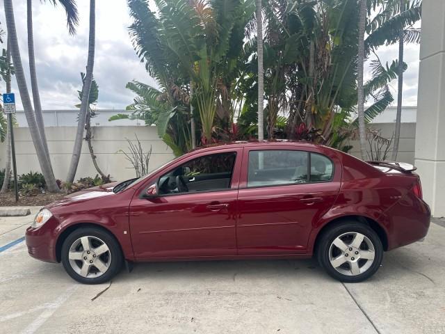 2008 Sport Red Tintcoat /Gray Chevrolet Cobalt LT LOW MILES 60,652 (1G1AL58F287) with an Ecotec 2.2L DOHC 16-Valve 4-Cyl SFI Engine engine, Automatic transmission, located at 4701 North Dixie Hwy, Pompano Beach, FL, 33064, (954) 422-2889, 26.240938, -80.123474 - OUR WEBPAGE FLORIDACARS1.COM HAS OVER 100 PHOTOS AND FREE CARFAX LINK 2008 CHEVROLET COBALT LT VIN: 1G1AL58F287179140 1 G 1 A L 5 8 F 2 8 7 1 7 9 1 4 0 SEDAN 4 DR 2.2L I4 F DOHC 16V GASOLINE 33 MPG GREAT COMMUTER CAR FRONT WHEEL DRIVE Top Features Alloy Wheels Cloth Seats Satellite Radio Ready Basic - Photo#4