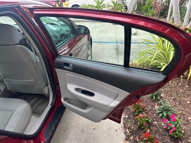 2008 Sport Red Tintcoat /Gray Chevrolet Cobalt LT LOW MILES 60,652 (1G1AL58F287) with an Ecotec 2.2L DOHC 16-Valve 4-Cyl SFI Engine engine, Automatic transmission, located at 4701 North Dixie Hwy, Pompano Beach, FL, 33064, (954) 422-2889, 26.240938, -80.123474 - OUR WEBPAGE FLORIDACARS1.COM HAS OVER 100 PHOTOS AND FREE CARFAX LINK 2008 CHEVROLET COBALT LT VIN: 1G1AL58F287179140 1 G 1 A L 5 8 F 2 8 7 1 7 9 1 4 0 SEDAN 4 DR 2.2L I4 F DOHC 16V GASOLINE 33 MPG GREAT COMMUTER CAR FRONT WHEEL DRIVE Top Features Alloy Wheels Cloth Seats Satellite Radio Ready Basic - Photo#66