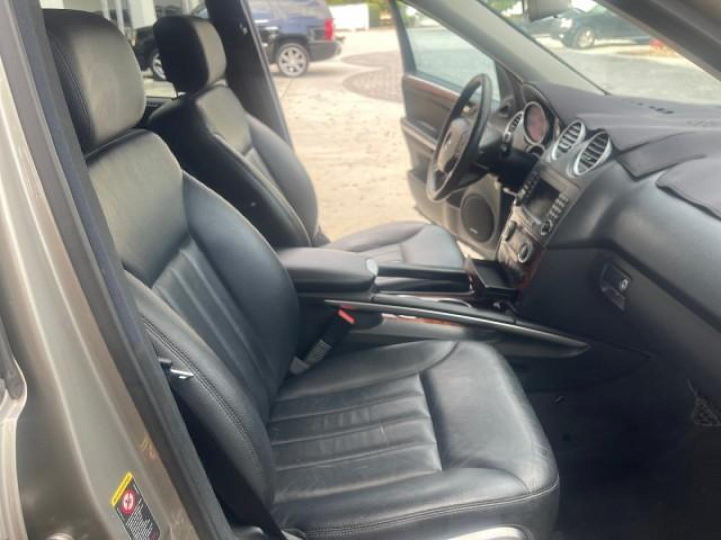 2006 Pewter Metallic /Black Mercedes-Benz M-Class 5.0L AWD CLEAN (4JGBB75E46A) with an 5.0L SMPI SOHC 24-Valve V8 Engine engine, Automatic transmission, located at 4701 North Dixie Hwy, Pompano Beach, FL, 33064, (954) 422-2889, 26.240938, -80.123474 - OUR WEBPAGE FLORIDACARS1.COM HAS OVER 100 PHOTOS AND FREE CARFAX LINK 2006 MERCEDES-BENZ M-CLASS ML 500 VIN: 4JGBB75E46A011498 4 J G B B 7 5 E 4 6 A 0 1 1 4 9 8 4 DOOR WAGON/SPORT UTILITY 5.0L V8 F SOHC 24V GASOLINE ALL WHEEL DRIVE NO RECALLS THIS IS A TRADE IN THE LADY TRAVELED HWY MILES,CLEAN 2 OW - Photo#12