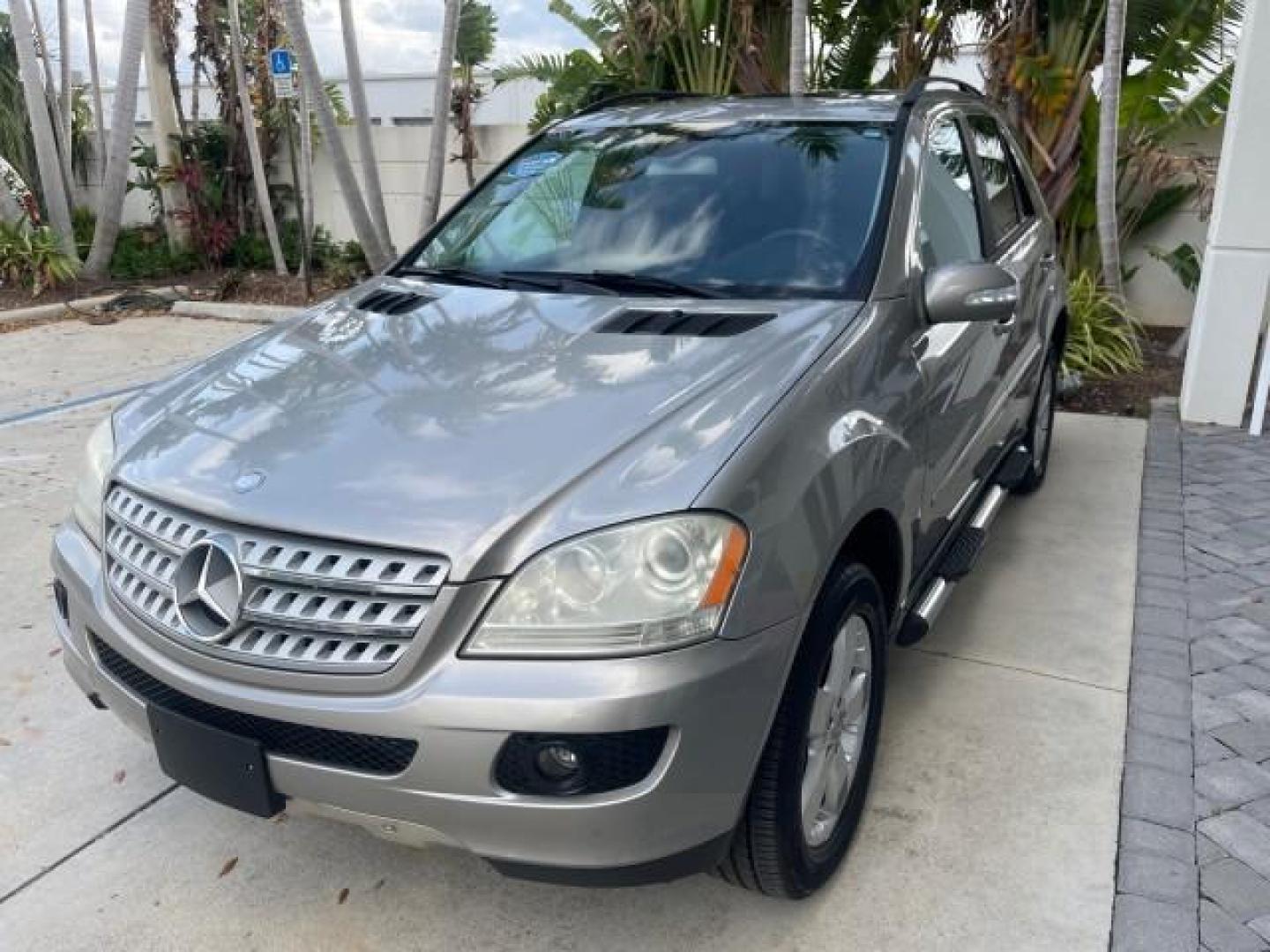 2006 Pewter Metallic /Black Mercedes-Benz M-Class 5.0L AWD CLEAN (4JGBB75E46A) with an 5.0L SMPI SOHC 24-Valve V8 Engine engine, Automatic transmission, located at 4701 North Dixie Hwy, Pompano Beach, FL, 33064, (954) 422-2889, 26.240938, -80.123474 - OUR WEBPAGE FLORIDACARS1.COM HAS OVER 100 PHOTOS AND FREE CARFAX LINK 2006 MERCEDES-BENZ M-CLASS ML 500 VIN: 4JGBB75E46A011498 4 J G B B 7 5 E 4 6 A 0 1 1 4 9 8 4 DOOR WAGON/SPORT UTILITY 5.0L V8 F SOHC 24V GASOLINE ALL WHEEL DRIVE NO RECALLS THIS IS A TRADE IN THE LADY TRAVELED HWY MILES,CLEAN 2 OW - Photo#3