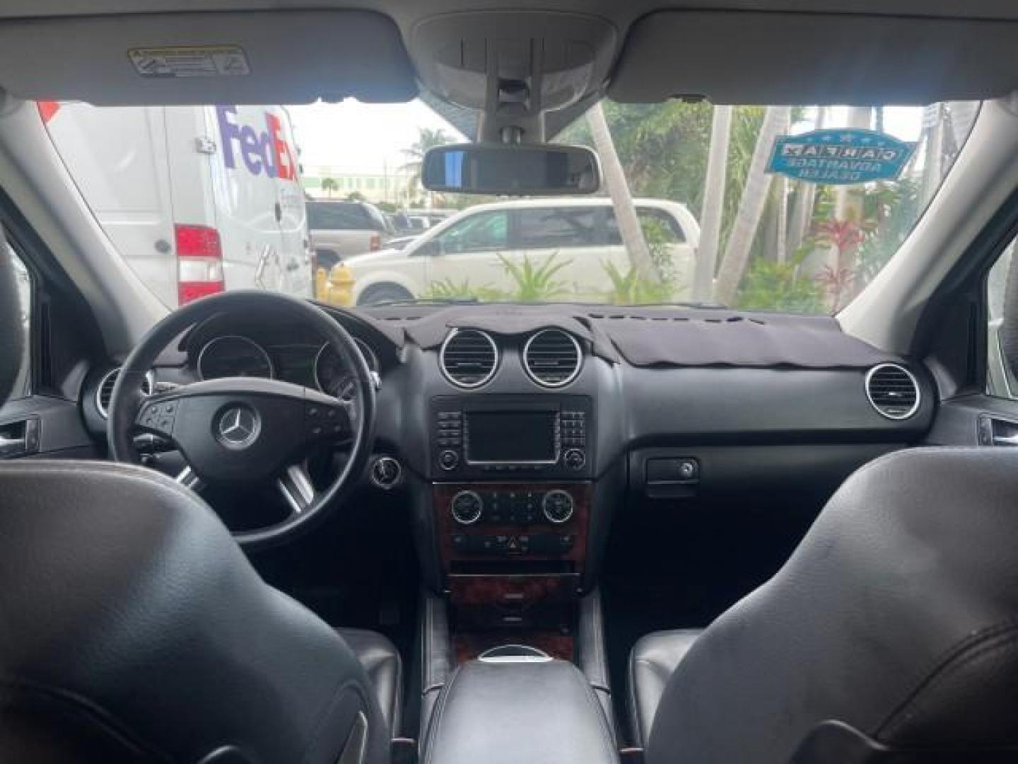 2006 Pewter Metallic /Black Mercedes-Benz M-Class 5.0L AWD CLEAN (4JGBB75E46A) with an 5.0L SMPI SOHC 24-Valve V8 Engine engine, Automatic transmission, located at 4701 North Dixie Hwy, Pompano Beach, FL, 33064, (954) 422-2889, 26.240938, -80.123474 - OUR WEBPAGE FLORIDACARS1.COM HAS OVER 100 PHOTOS AND FREE CARFAX LINK 2006 MERCEDES-BENZ M-CLASS ML 500 VIN: 4JGBB75E46A011498 4 J G B B 7 5 E 4 6 A 0 1 1 4 9 8 4 DOOR WAGON/SPORT UTILITY 5.0L V8 F SOHC 24V GASOLINE ALL WHEEL DRIVE NO RECALLS THIS IS A TRADE IN THE LADY TRAVELED HWY MILES,CLEAN 2 OW - Photo#49