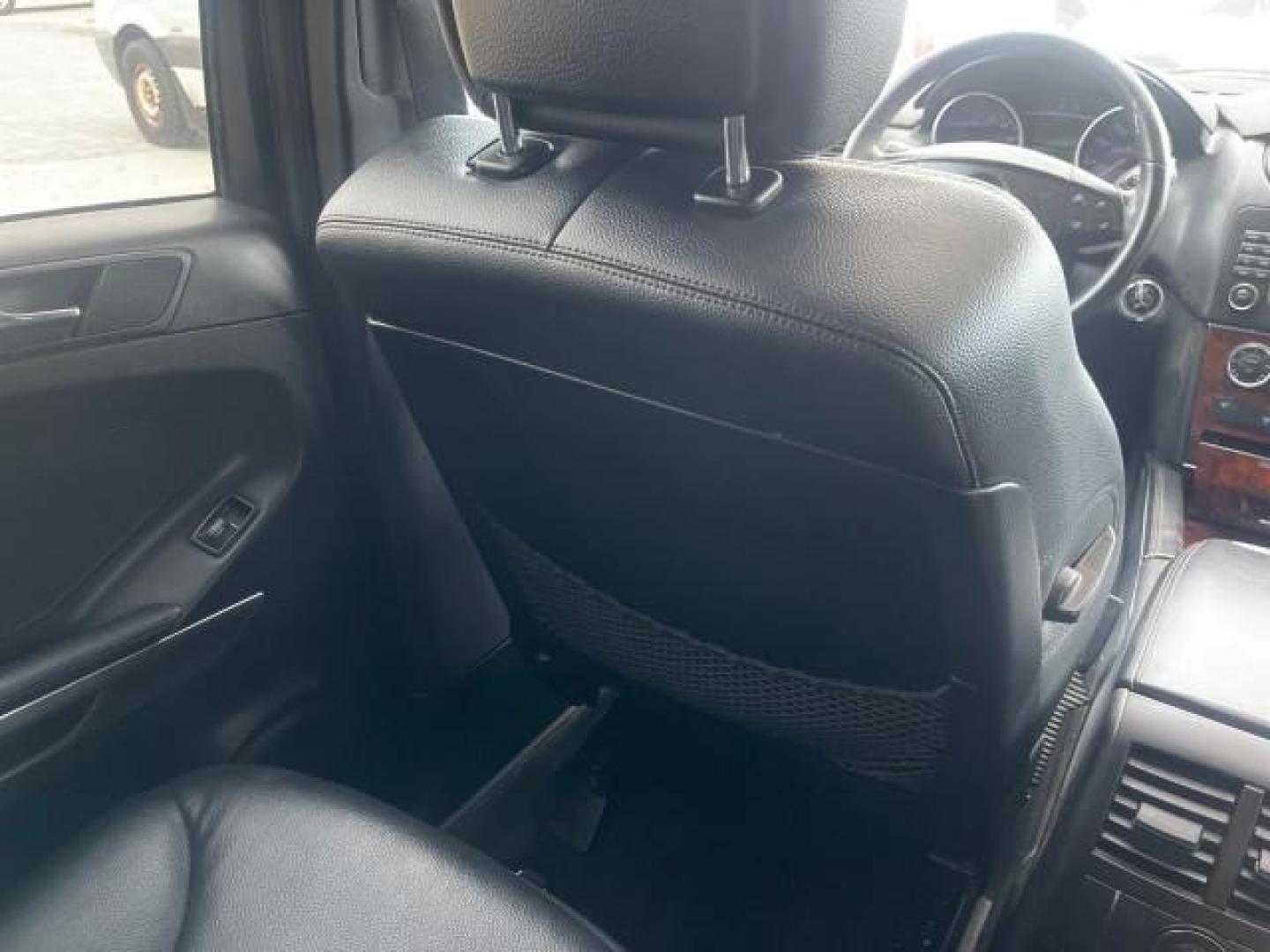 2006 Pewter Metallic /Black Mercedes-Benz M-Class 5.0L AWD CLEAN (4JGBB75E46A) with an 5.0L SMPI SOHC 24-Valve V8 Engine engine, Automatic transmission, located at 4701 North Dixie Hwy, Pompano Beach, FL, 33064, (954) 422-2889, 26.240938, -80.123474 - OUR WEBPAGE FLORIDACARS1.COM HAS OVER 100 PHOTOS AND FREE CARFAX LINK 2006 MERCEDES-BENZ M-CLASS ML 500 VIN: 4JGBB75E46A011498 4 J G B B 7 5 E 4 6 A 0 1 1 4 9 8 4 DOOR WAGON/SPORT UTILITY 5.0L V8 F SOHC 24V GASOLINE ALL WHEEL DRIVE NO RECALLS THIS IS A TRADE IN THE LADY TRAVELED HWY MILES,CLEAN 2 OW - Photo#54