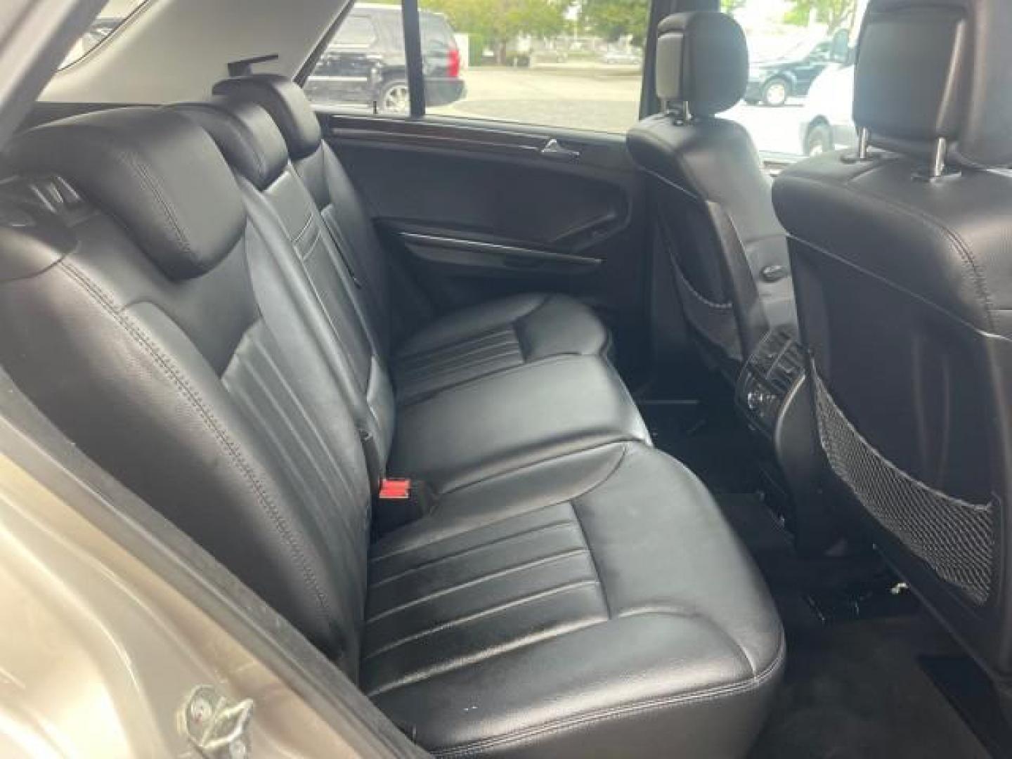 2006 Pewter Metallic /Black Mercedes-Benz M-Class 5.0L AWD CLEAN (4JGBB75E46A) with an 5.0L SMPI SOHC 24-Valve V8 Engine engine, Automatic transmission, located at 4701 North Dixie Hwy, Pompano Beach, FL, 33064, (954) 422-2889, 26.240938, -80.123474 - OUR WEBPAGE FLORIDACARS1.COM HAS OVER 100 PHOTOS AND FREE CARFAX LINK 2006 MERCEDES-BENZ M-CLASS ML 500 VIN: 4JGBB75E46A011498 4 J G B B 7 5 E 4 6 A 0 1 1 4 9 8 4 DOOR WAGON/SPORT UTILITY 5.0L V8 F SOHC 24V GASOLINE ALL WHEEL DRIVE NO RECALLS THIS IS A TRADE IN THE LADY TRAVELED HWY MILES,CLEAN 2 OW - Photo#62
