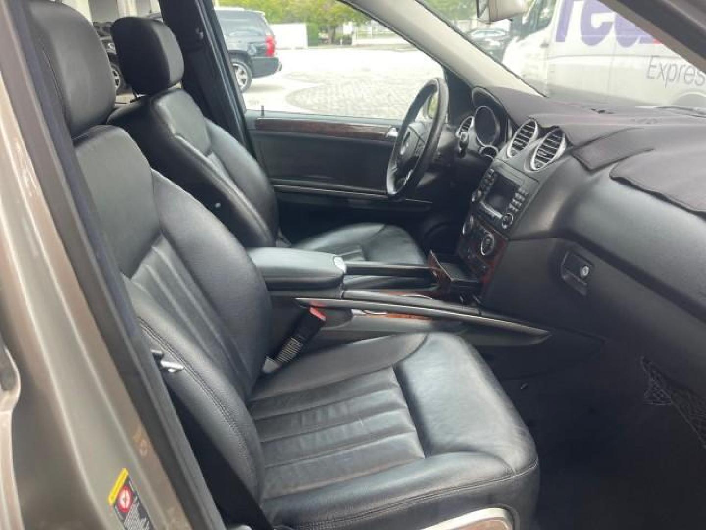 2006 Pewter Metallic /Black Mercedes-Benz M-Class 5.0L AWD CLEAN (4JGBB75E46A) with an 5.0L SMPI SOHC 24-Valve V8 Engine engine, Automatic transmission, located at 4701 North Dixie Hwy, Pompano Beach, FL, 33064, (954) 422-2889, 26.240938, -80.123474 - OUR WEBPAGE FLORIDACARS1.COM HAS OVER 100 PHOTOS AND FREE CARFAX LINK 2006 MERCEDES-BENZ M-CLASS ML 500 VIN: 4JGBB75E46A011498 4 J G B B 7 5 E 4 6 A 0 1 1 4 9 8 4 DOOR WAGON/SPORT UTILITY 5.0L V8 F SOHC 24V GASOLINE ALL WHEEL DRIVE NO RECALLS THIS IS A TRADE IN THE LADY TRAVELED HWY MILES,CLEAN 2 OW - Photo#66