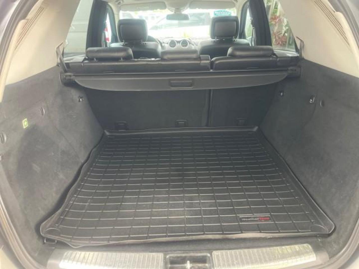 2006 Pewter Metallic /Black Mercedes-Benz M-Class 5.0L AWD CLEAN (4JGBB75E46A) with an 5.0L SMPI SOHC 24-Valve V8 Engine engine, Automatic transmission, located at 4701 North Dixie Hwy, Pompano Beach, FL, 33064, (954) 422-2889, 26.240938, -80.123474 - OUR WEBPAGE FLORIDACARS1.COM HAS OVER 100 PHOTOS AND FREE CARFAX LINK 2006 MERCEDES-BENZ M-CLASS ML 500 VIN: 4JGBB75E46A011498 4 J G B B 7 5 E 4 6 A 0 1 1 4 9 8 4 DOOR WAGON/SPORT UTILITY 5.0L V8 F SOHC 24V GASOLINE ALL WHEEL DRIVE NO RECALLS THIS IS A TRADE IN THE LADY TRAVELED HWY MILES,CLEAN 2 OW - Photo#89