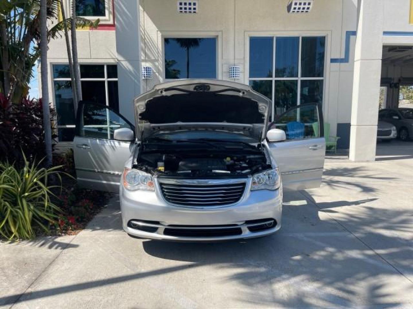 2012 Bright Silver Metallic /Black/Light Graystone Interior Chrysler Town and Country Touring (2C4RC1BG8CR) with an 3.6L V6 Cylinder Engine engine, Automatic transmission, located at 4701 North Dixie Hwy, Pompano Beach, FL, 33064, (954) 422-2889, 26.240938, -80.123474 - OUR WEBPAGE FLORIDACARS1.COM HAS OVER 100 PHOTOS AND FREE CARFAX LINK 2012 CHRYSLER TOWN AND COUNTRY TOURING VIN: 2C4RC1BG8CR188811 2 C 4 R C 1 B G 8 C R 1 8 8 8 1 1 VAN 3.6L V6 F DOHC 24V GASOLINE FRONT WHEEL DRIVE NO RECALLS THIS IS A TRADE IN THE LADY TRAVELED HWY MILES,THE OWNER JUST SPENT $1800 - Photo#16