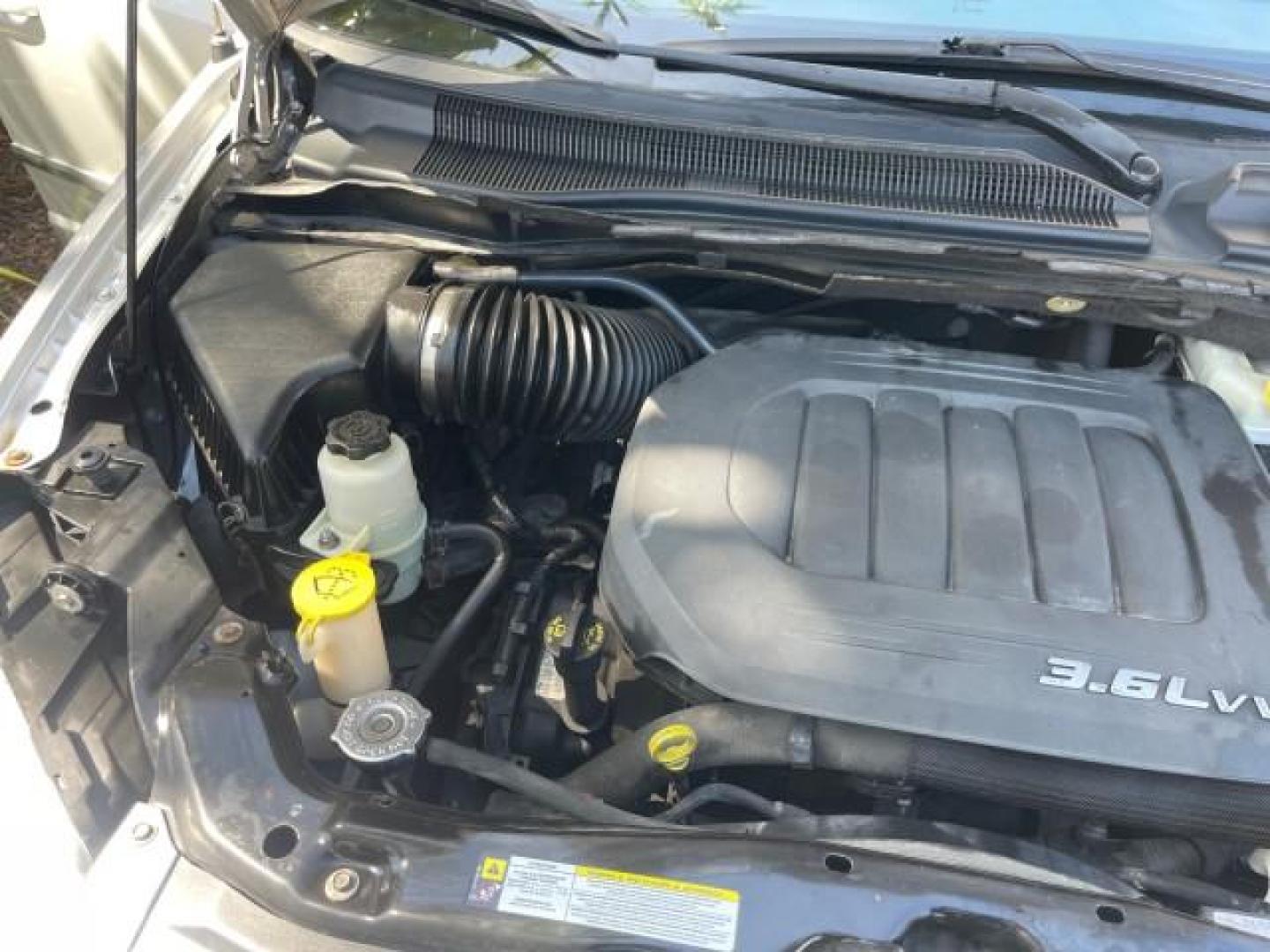 2012 Bright Silver Metallic /Black/Light Graystone Interior Chrysler Town and Country Touring (2C4RC1BG8CR) with an 3.6L V6 Cylinder Engine engine, Automatic transmission, located at 4701 North Dixie Hwy, Pompano Beach, FL, 33064, (954) 422-2889, 26.240938, -80.123474 - OUR WEBPAGE FLORIDACARS1.COM HAS OVER 100 PHOTOS AND FREE CARFAX LINK 2012 CHRYSLER TOWN AND COUNTRY TOURING VIN: 2C4RC1BG8CR188811 2 C 4 R C 1 B G 8 C R 1 8 8 8 1 1 VAN 3.6L V6 F DOHC 24V GASOLINE FRONT WHEEL DRIVE NO RECALLS THIS IS A TRADE IN THE LADY TRAVELED HWY MILES,THE OWNER JUST SPENT $1800 - Photo#25