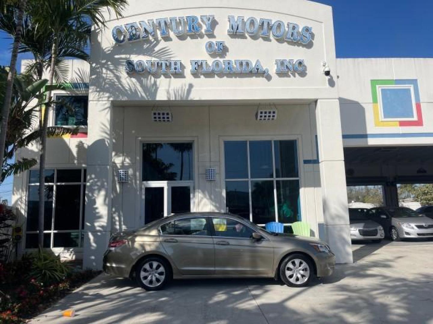 2009 Bold Beige Metallic /Ivory Honda Accord Sdn EX-L LOW MILES 31,501 (1HGCP26819A) with an 2.4L DOHC MPFI 16-Valve i-VTEC I4 Engine engine, Automatic transmission, located at 4701 North Dixie Hwy, Pompano Beach, FL, 33064, (954) 422-2889, 26.240938, -80.123474 - OUR WEBPAGE FLORIDACARS1.COM HAS OVER 100 PHOTOS AND FREE CARFAX LINK 2009 HONDA ACCORD EX-L VIN: 1HGCP26819A145607 1 H G C P 2 6 8 1 9 A 1 4 5 6 0 7 SEDAN 4 DR 2.4L I4 F DOHC 16V 31 MPG GASOLINE FRONT WHEEL DRIVE Top Features Alloy Wheels Satellite Radio Ready Front Seat Heaters Sunroof(s) Leather - Photo#0