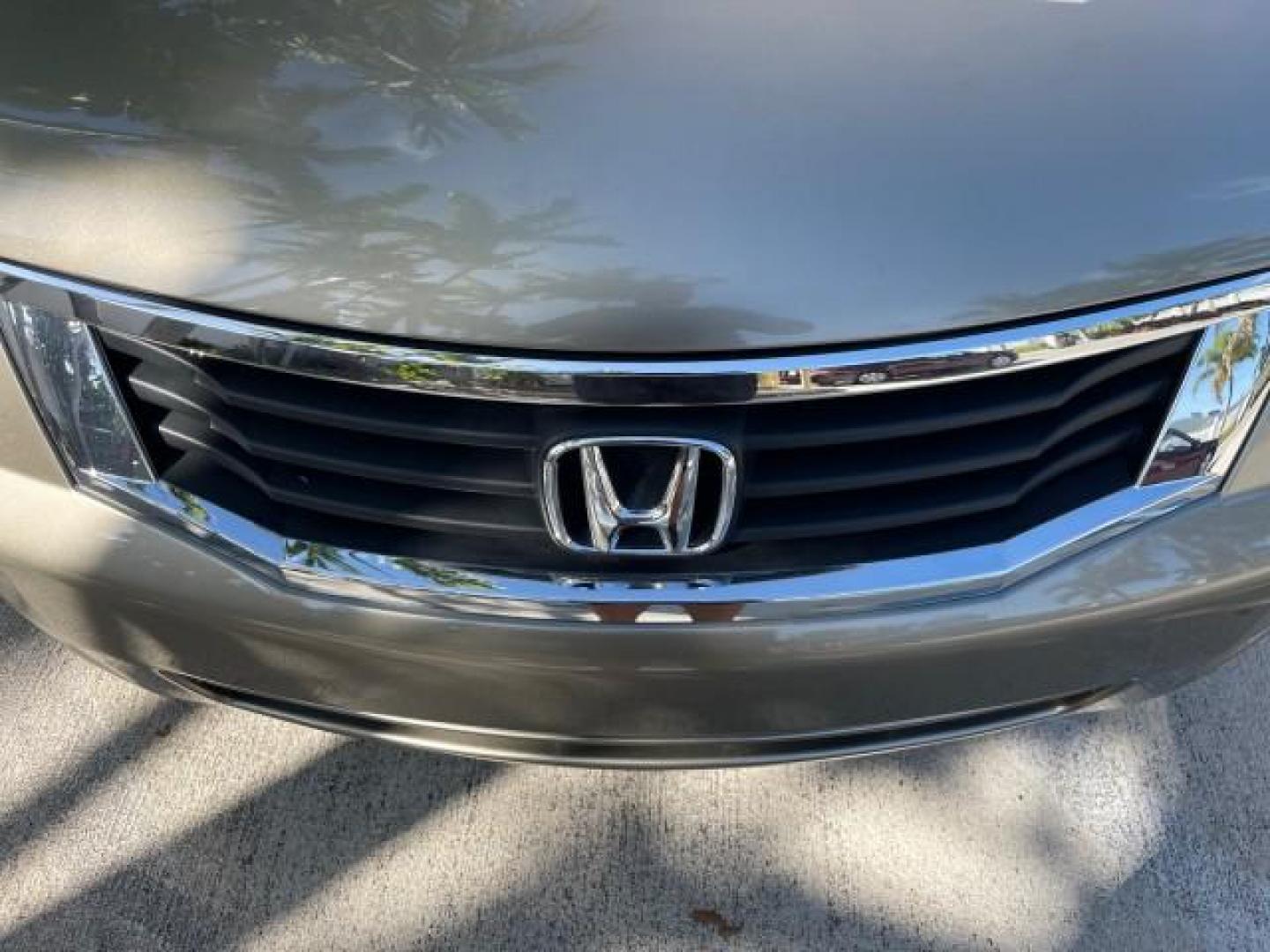 2009 Bold Beige Metallic /Ivory Honda Accord Sdn EX-L LOW MILES 31,501 (1HGCP26819A) with an 2.4L DOHC MPFI 16-Valve i-VTEC I4 Engine engine, Automatic transmission, located at 4701 North Dixie Hwy, Pompano Beach, FL, 33064, (954) 422-2889, 26.240938, -80.123474 - OUR WEBPAGE FLORIDACARS1.COM HAS OVER 100 PHOTOS AND FREE CARFAX LINK 2009 HONDA ACCORD EX-L VIN: 1HGCP26819A145607 1 H G C P 2 6 8 1 9 A 1 4 5 6 0 7 SEDAN 4 DR 2.4L I4 F DOHC 16V 31 MPG GASOLINE FRONT WHEEL DRIVE Top Features Alloy Wheels Satellite Radio Ready Front Seat Heaters Sunroof(s) Leather - Photo#99