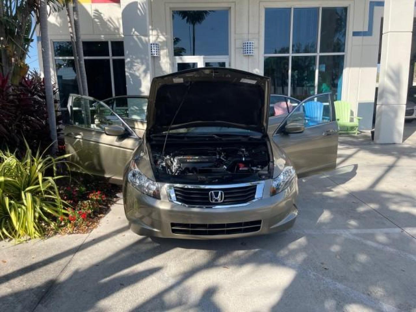 2009 Bold Beige Metallic /Ivory Honda Accord Sdn EX-L LOW MILES 31,501 (1HGCP26819A) with an 2.4L DOHC MPFI 16-Valve i-VTEC I4 Engine engine, Automatic transmission, located at 4701 North Dixie Hwy, Pompano Beach, FL, 33064, (954) 422-2889, 26.240938, -80.123474 - OUR WEBPAGE FLORIDACARS1.COM HAS OVER 100 PHOTOS AND FREE CARFAX LINK 2009 HONDA ACCORD EX-L VIN: 1HGCP26819A145607 1 H G C P 2 6 8 1 9 A 1 4 5 6 0 7 SEDAN 4 DR 2.4L I4 F DOHC 16V 31 MPG GASOLINE FRONT WHEEL DRIVE Top Features Alloy Wheels Satellite Radio Ready Front Seat Heaters Sunroof(s) Leather - Photo#16