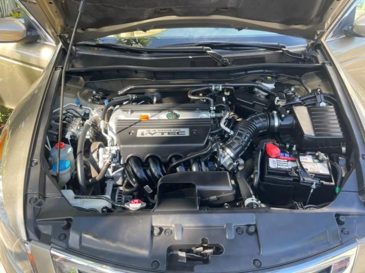 2009 Bold Beige Metallic /Ivory Honda Accord Sdn EX-L LOW MILES 31,501 (1HGCP26819A) with an 2.4L DOHC MPFI 16-Valve i-VTEC I4 Engine engine, Automatic transmission, located at 4701 North Dixie Hwy, Pompano Beach, FL, 33064, (954) 422-2889, 26.240938, -80.123474 - OUR WEBPAGE FLORIDACARS1.COM HAS OVER 100 PHOTOS AND FREE CARFAX LINK 2009 HONDA ACCORD EX-L VIN: 1HGCP26819A145607 1 H G C P 2 6 8 1 9 A 1 4 5 6 0 7 SEDAN 4 DR 2.4L I4 F DOHC 16V 31 MPG GASOLINE FRONT WHEEL DRIVE Top Features Alloy Wheels Satellite Radio Ready Front Seat Heaters Sunroof(s) Leather - Photo#17