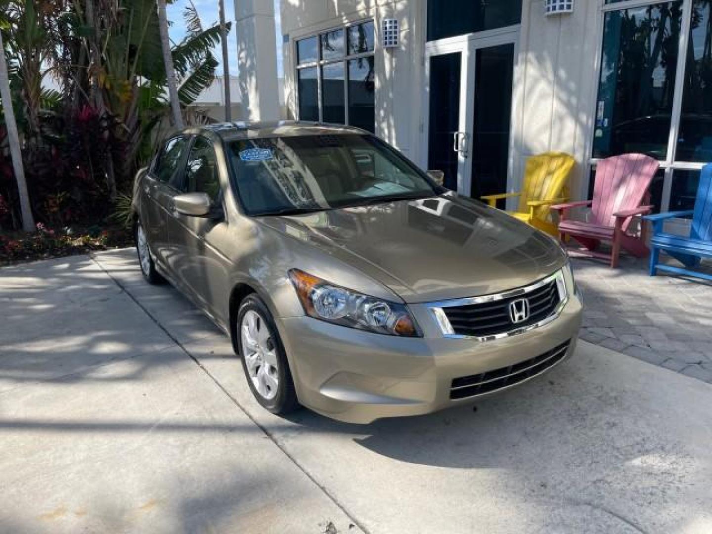 2009 Bold Beige Metallic /Ivory Honda Accord Sdn EX-L LOW MILES 31,501 (1HGCP26819A) with an 2.4L DOHC MPFI 16-Valve i-VTEC I4 Engine engine, Automatic transmission, located at 4701 North Dixie Hwy, Pompano Beach, FL, 33064, (954) 422-2889, 26.240938, -80.123474 - OUR WEBPAGE FLORIDACARS1.COM HAS OVER 100 PHOTOS AND FREE CARFAX LINK 2009 HONDA ACCORD EX-L VIN: 1HGCP26819A145607 1 H G C P 2 6 8 1 9 A 1 4 5 6 0 7 SEDAN 4 DR 2.4L I4 F DOHC 16V 31 MPG GASOLINE FRONT WHEEL DRIVE Top Features Alloy Wheels Satellite Radio Ready Front Seat Heaters Sunroof(s) Leather - Photo#1