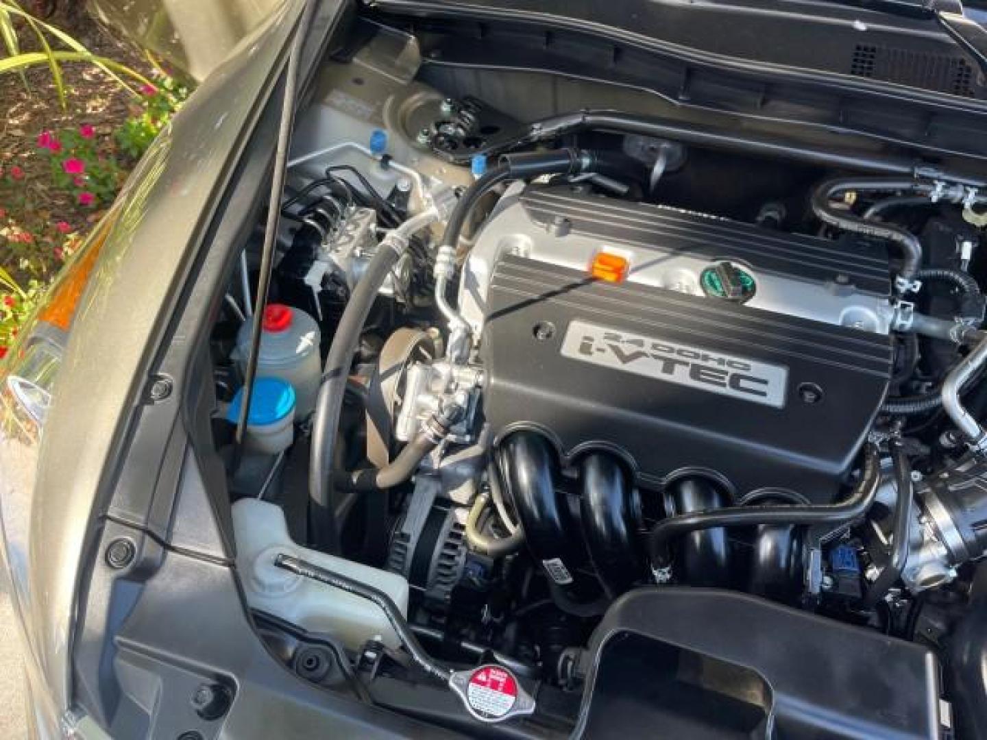 2009 Bold Beige Metallic /Ivory Honda Accord Sdn EX-L LOW MILES 31,501 (1HGCP26819A) with an 2.4L DOHC MPFI 16-Valve i-VTEC I4 Engine engine, Automatic transmission, located at 4701 North Dixie Hwy, Pompano Beach, FL, 33064, (954) 422-2889, 26.240938, -80.123474 - OUR WEBPAGE FLORIDACARS1.COM HAS OVER 100 PHOTOS AND FREE CARFAX LINK 2009 HONDA ACCORD EX-L VIN: 1HGCP26819A145607 1 H G C P 2 6 8 1 9 A 1 4 5 6 0 7 SEDAN 4 DR 2.4L I4 F DOHC 16V 31 MPG GASOLINE FRONT WHEEL DRIVE Top Features Alloy Wheels Satellite Radio Ready Front Seat Heaters Sunroof(s) Leather - Photo#26