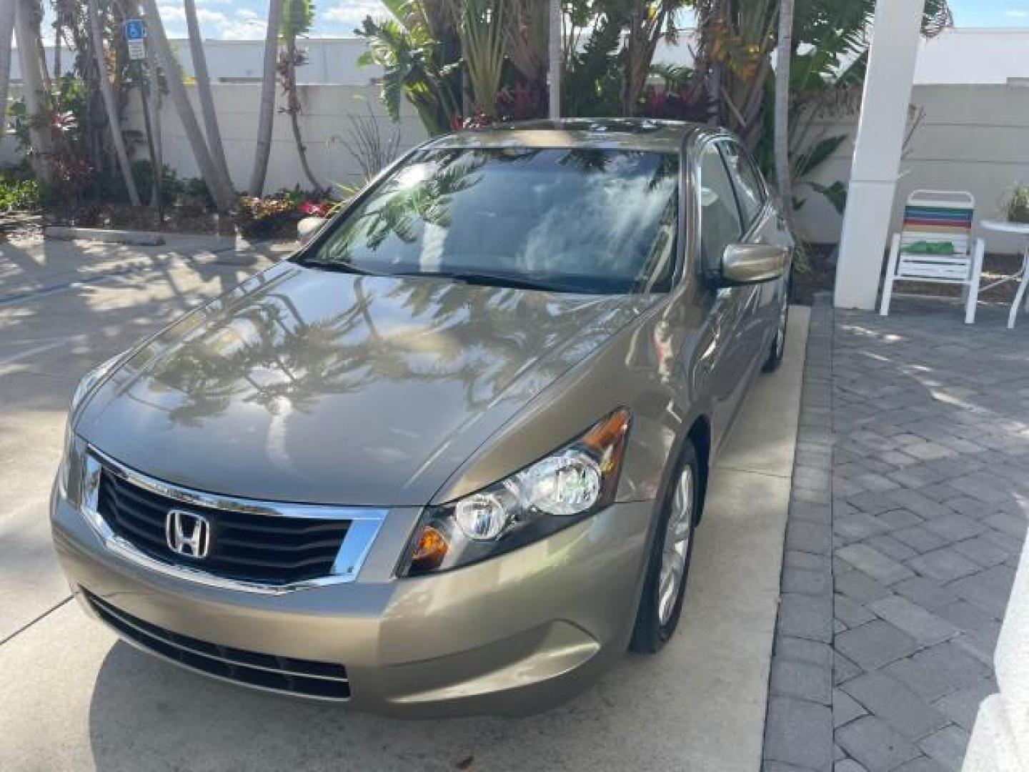 2009 Bold Beige Metallic /Ivory Honda Accord Sdn EX-L LOW MILES 31,501 (1HGCP26819A) with an 2.4L DOHC MPFI 16-Valve i-VTEC I4 Engine engine, Automatic transmission, located at 4701 North Dixie Hwy, Pompano Beach, FL, 33064, (954) 422-2889, 26.240938, -80.123474 - OUR WEBPAGE FLORIDACARS1.COM HAS OVER 100 PHOTOS AND FREE CARFAX LINK 2009 HONDA ACCORD EX-L VIN: 1HGCP26819A145607 1 H G C P 2 6 8 1 9 A 1 4 5 6 0 7 SEDAN 4 DR 2.4L I4 F DOHC 16V 31 MPG GASOLINE FRONT WHEEL DRIVE Top Features Alloy Wheels Satellite Radio Ready Front Seat Heaters Sunroof(s) Leather - Photo#3