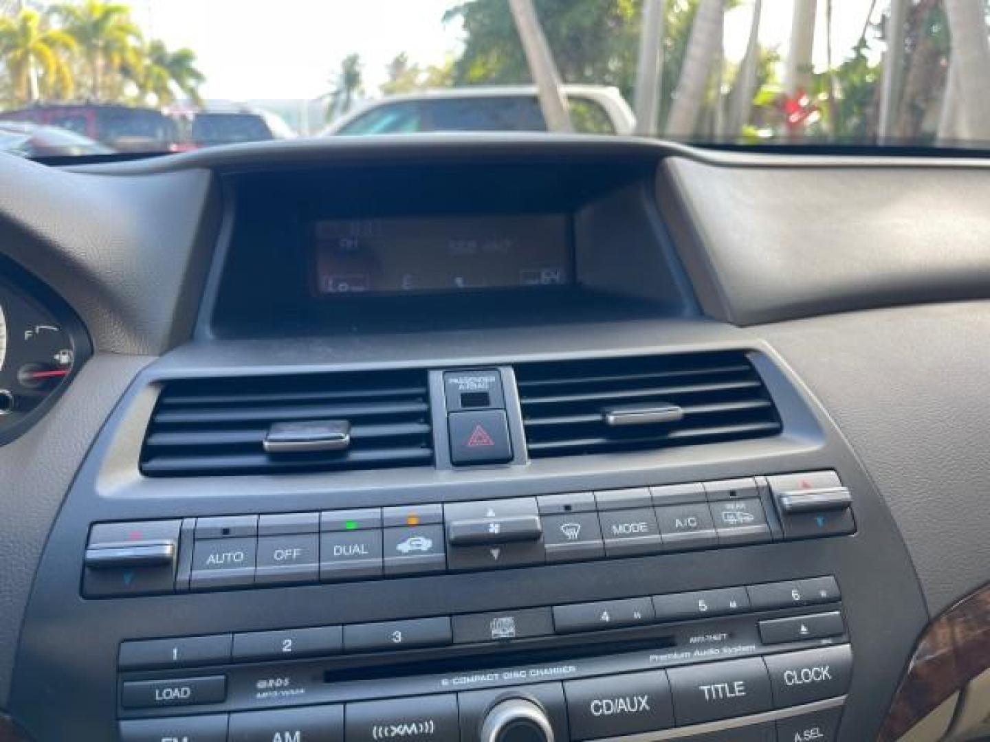 2009 Bold Beige Metallic /Ivory Honda Accord Sdn EX-L LOW MILES 31,501 (1HGCP26819A) with an 2.4L DOHC MPFI 16-Valve i-VTEC I4 Engine engine, Automatic transmission, located at 4701 North Dixie Hwy, Pompano Beach, FL, 33064, (954) 422-2889, 26.240938, -80.123474 - OUR WEBPAGE FLORIDACARS1.COM HAS OVER 100 PHOTOS AND FREE CARFAX LINK 2009 HONDA ACCORD EX-L VIN: 1HGCP26819A145607 1 H G C P 2 6 8 1 9 A 1 4 5 6 0 7 SEDAN 4 DR 2.4L I4 F DOHC 16V 31 MPG GASOLINE FRONT WHEEL DRIVE Top Features Alloy Wheels Satellite Radio Ready Front Seat Heaters Sunroof(s) Leather - Photo#40