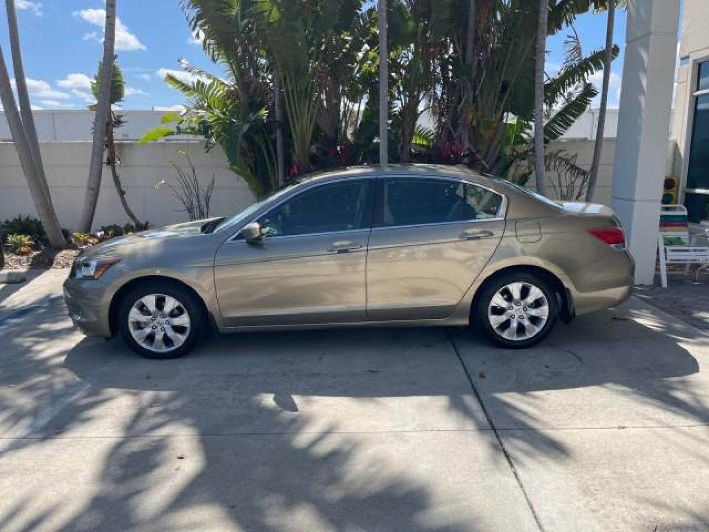 2009 Bold Beige Metallic /Ivory Honda Accord Sdn EX-L LOW MILES 31,501 (1HGCP26819A) with an 2.4L DOHC MPFI 16-Valve i-VTEC I4 Engine engine, Automatic transmission, located at 4701 North Dixie Hwy, Pompano Beach, FL, 33064, (954) 422-2889, 26.240938, -80.123474 - OUR WEBPAGE FLORIDACARS1.COM HAS OVER 100 PHOTOS AND FREE CARFAX LINK 2009 HONDA ACCORD EX-L VIN: 1HGCP26819A145607 1 H G C P 2 6 8 1 9 A 1 4 5 6 0 7 SEDAN 4 DR 2.4L I4 F DOHC 16V 31 MPG GASOLINE FRONT WHEEL DRIVE Top Features Alloy Wheels Satellite Radio Ready Front Seat Heaters Sunroof(s) Leather - Photo#4