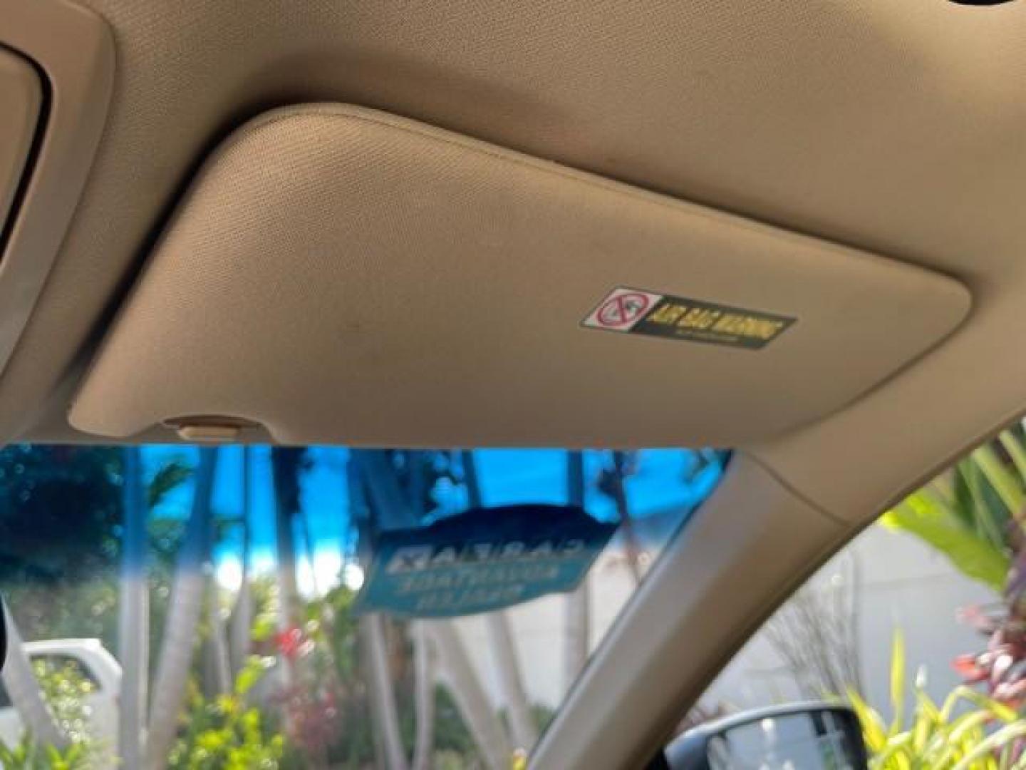 2009 Bold Beige Metallic /Ivory Honda Accord Sdn EX-L LOW MILES 31,501 (1HGCP26819A) with an 2.4L DOHC MPFI 16-Valve i-VTEC I4 Engine engine, Automatic transmission, located at 4701 North Dixie Hwy, Pompano Beach, FL, 33064, (954) 422-2889, 26.240938, -80.123474 - OUR WEBPAGE FLORIDACARS1.COM HAS OVER 100 PHOTOS AND FREE CARFAX LINK 2009 HONDA ACCORD EX-L VIN: 1HGCP26819A145607 1 H G C P 2 6 8 1 9 A 1 4 5 6 0 7 SEDAN 4 DR 2.4L I4 F DOHC 16V 31 MPG GASOLINE FRONT WHEEL DRIVE Top Features Alloy Wheels Satellite Radio Ready Front Seat Heaters Sunroof(s) Leather - Photo#52