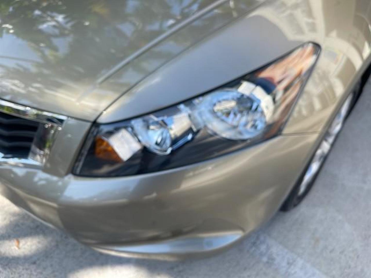 2009 Bold Beige Metallic /Ivory Honda Accord Sdn EX-L LOW MILES 31,501 (1HGCP26819A) with an 2.4L DOHC MPFI 16-Valve i-VTEC I4 Engine engine, Automatic transmission, located at 4701 North Dixie Hwy, Pompano Beach, FL, 33064, (954) 422-2889, 26.240938, -80.123474 - OUR WEBPAGE FLORIDACARS1.COM HAS OVER 100 PHOTOS AND FREE CARFAX LINK 2009 HONDA ACCORD EX-L VIN: 1HGCP26819A145607 1 H G C P 2 6 8 1 9 A 1 4 5 6 0 7 SEDAN 4 DR 2.4L I4 F DOHC 16V 31 MPG GASOLINE FRONT WHEEL DRIVE Top Features Alloy Wheels Satellite Radio Ready Front Seat Heaters Sunroof(s) Leather - Photo#59